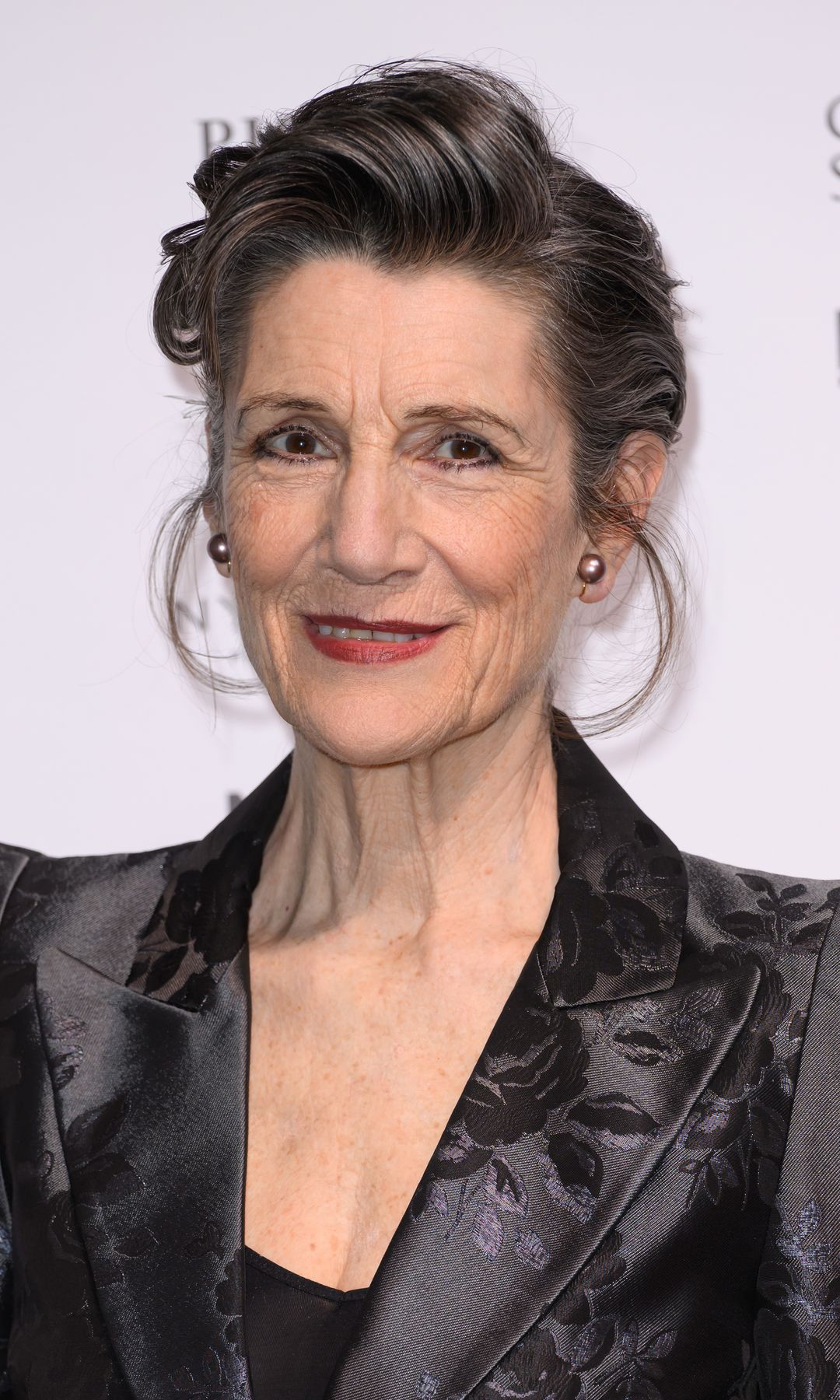 Harriet Walter in a black dress