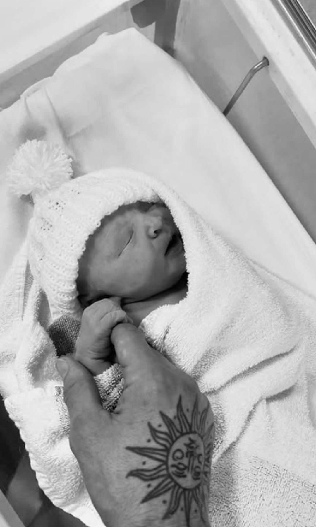 Black-and-white photo of a baby