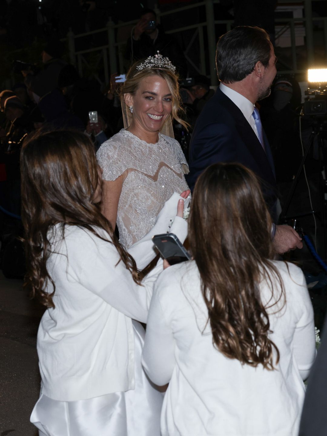 Chrysi Vardinogianni smiling at two of her flower girls