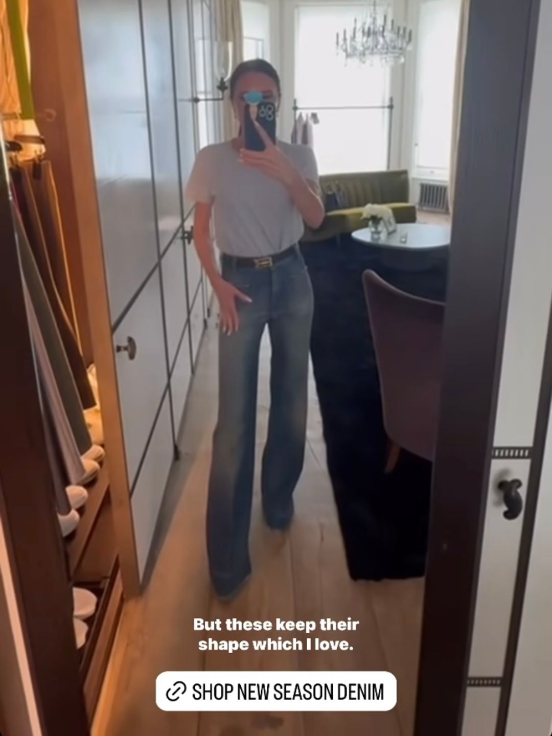 Victoria Beckham wearing jeans and a grey T-shirt