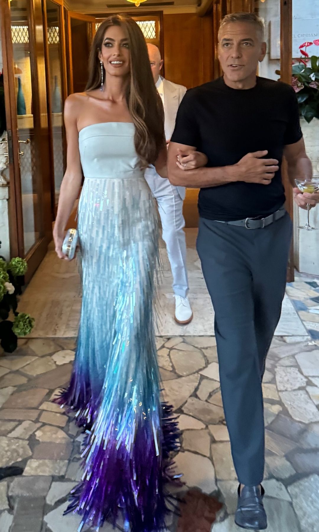 Amal stunned in a Bach Mai ice blue dress