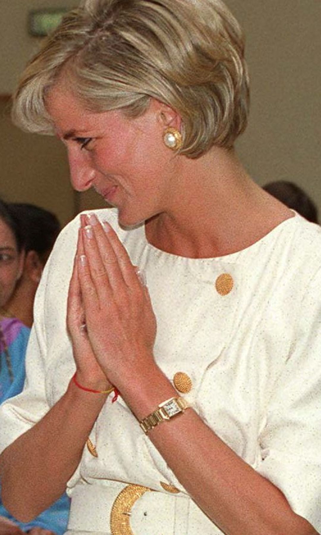 Princess Diana wearing her 18-karat gold Cartier Tank Francaise