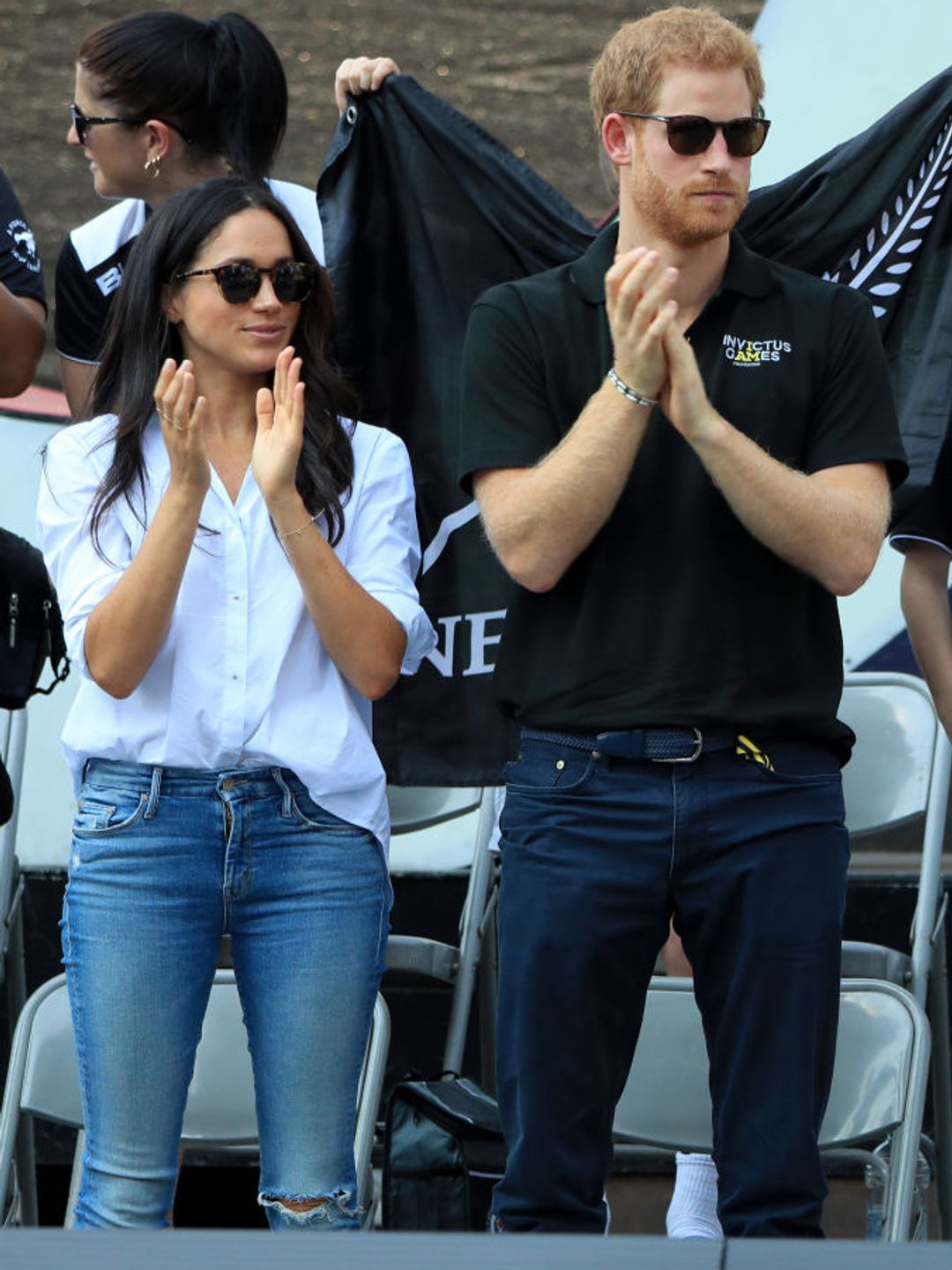 Meghan Markle loves a classic shirt and jeans combo