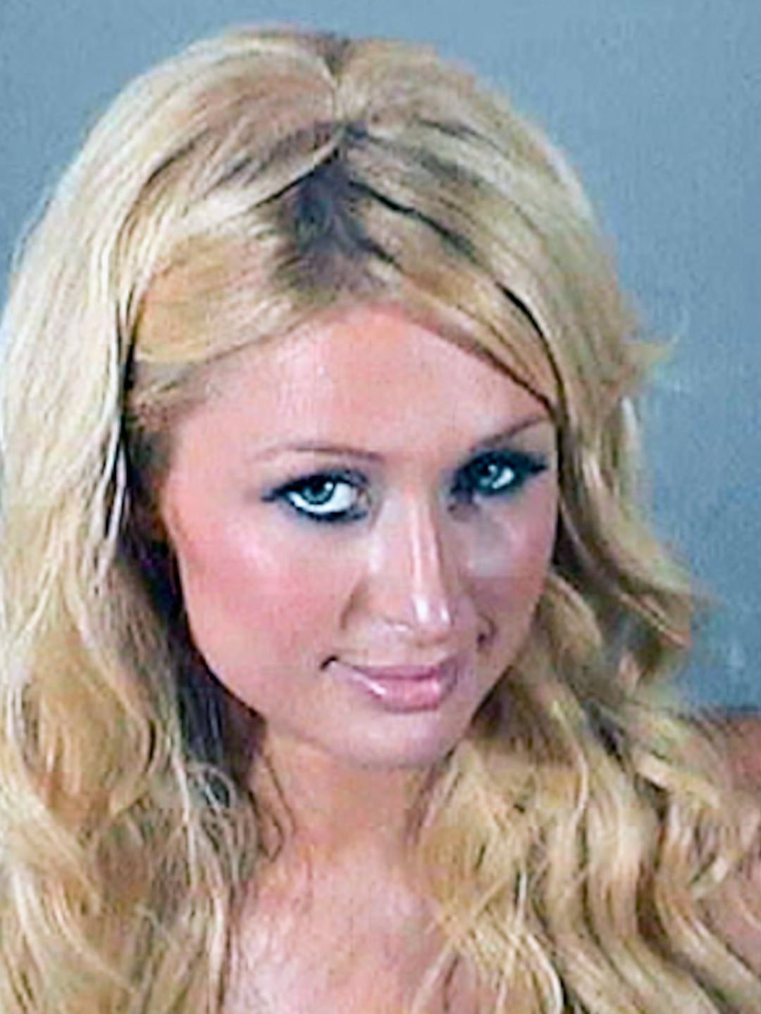 Headshot of Paris Hilton's mugshot