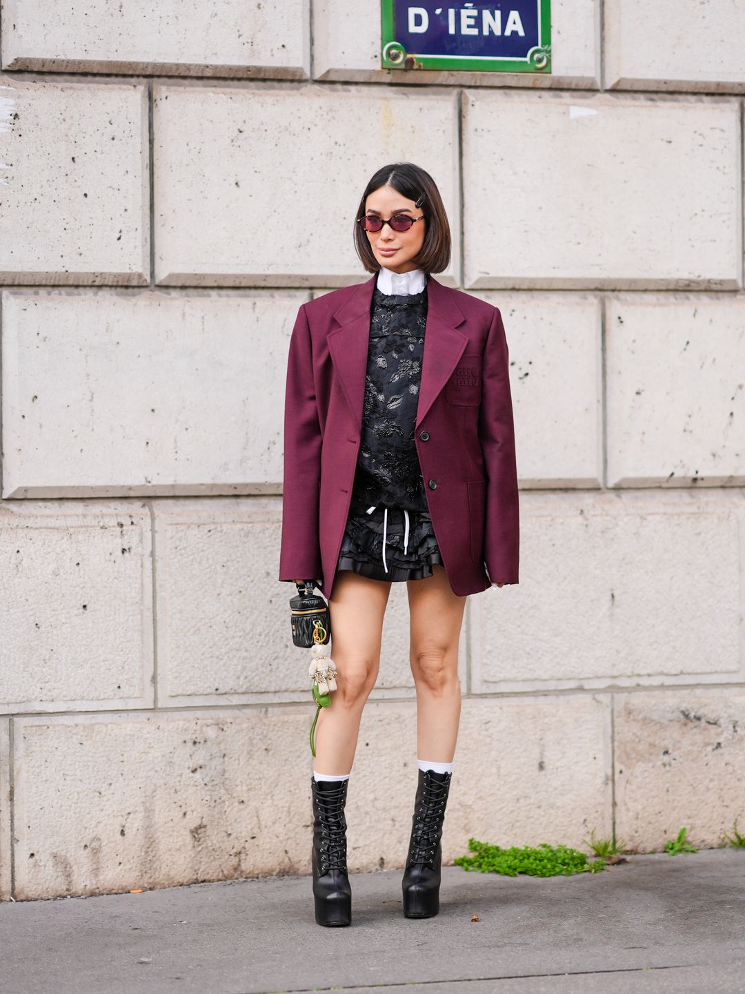 We love how Heart Evangelista has paired this burgundy blazer over an all-black ensemble.