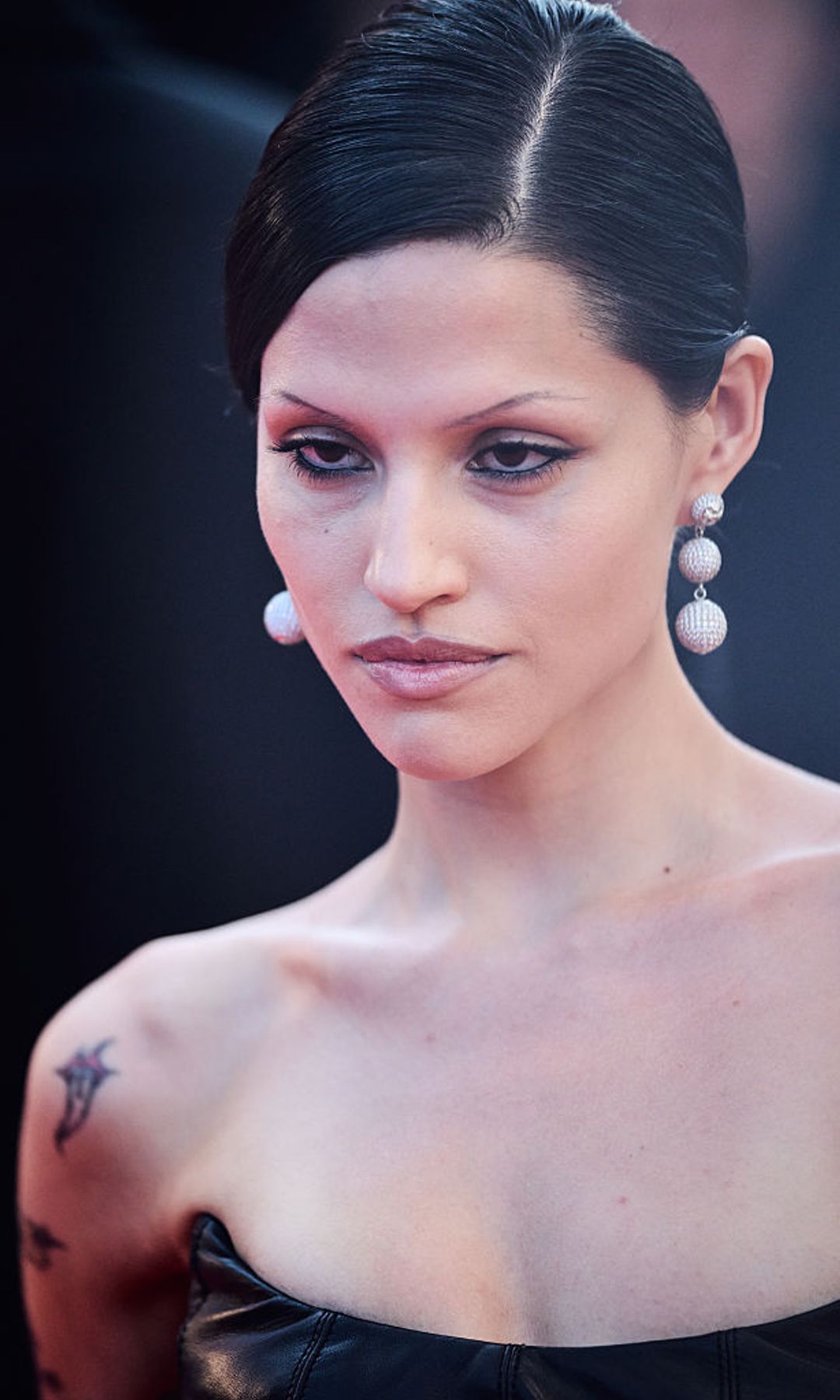 Gabriette Bechtel skinny brows and pearl earrings