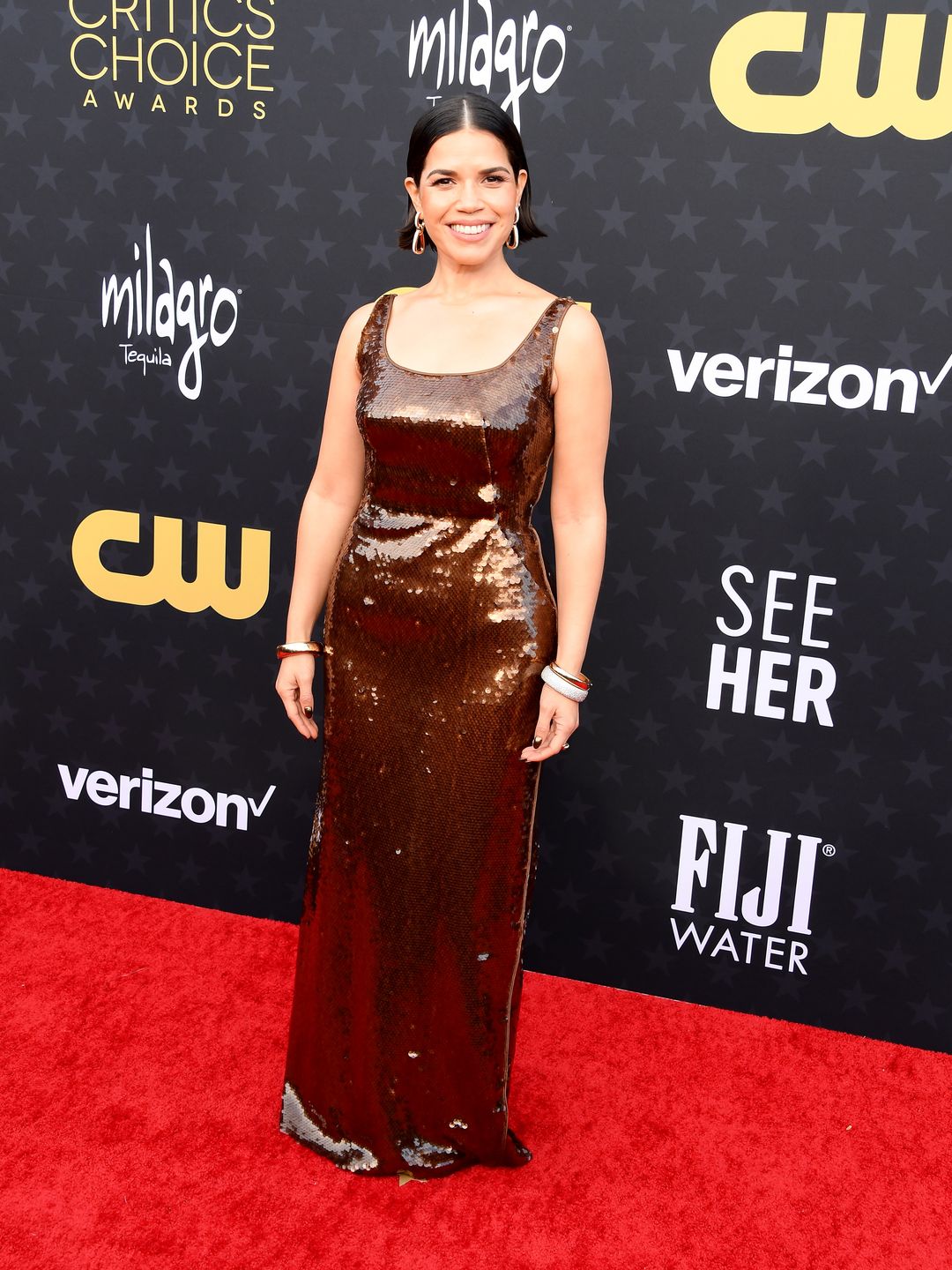 America Ferrera wearing a chocolate-hued sequin gown 