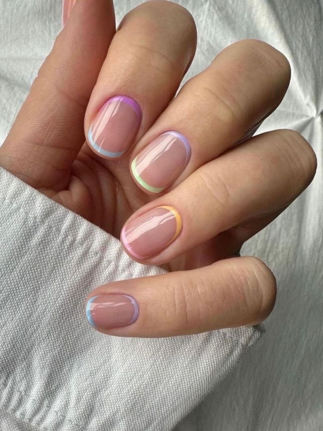 Neutral nails with pastel accents 