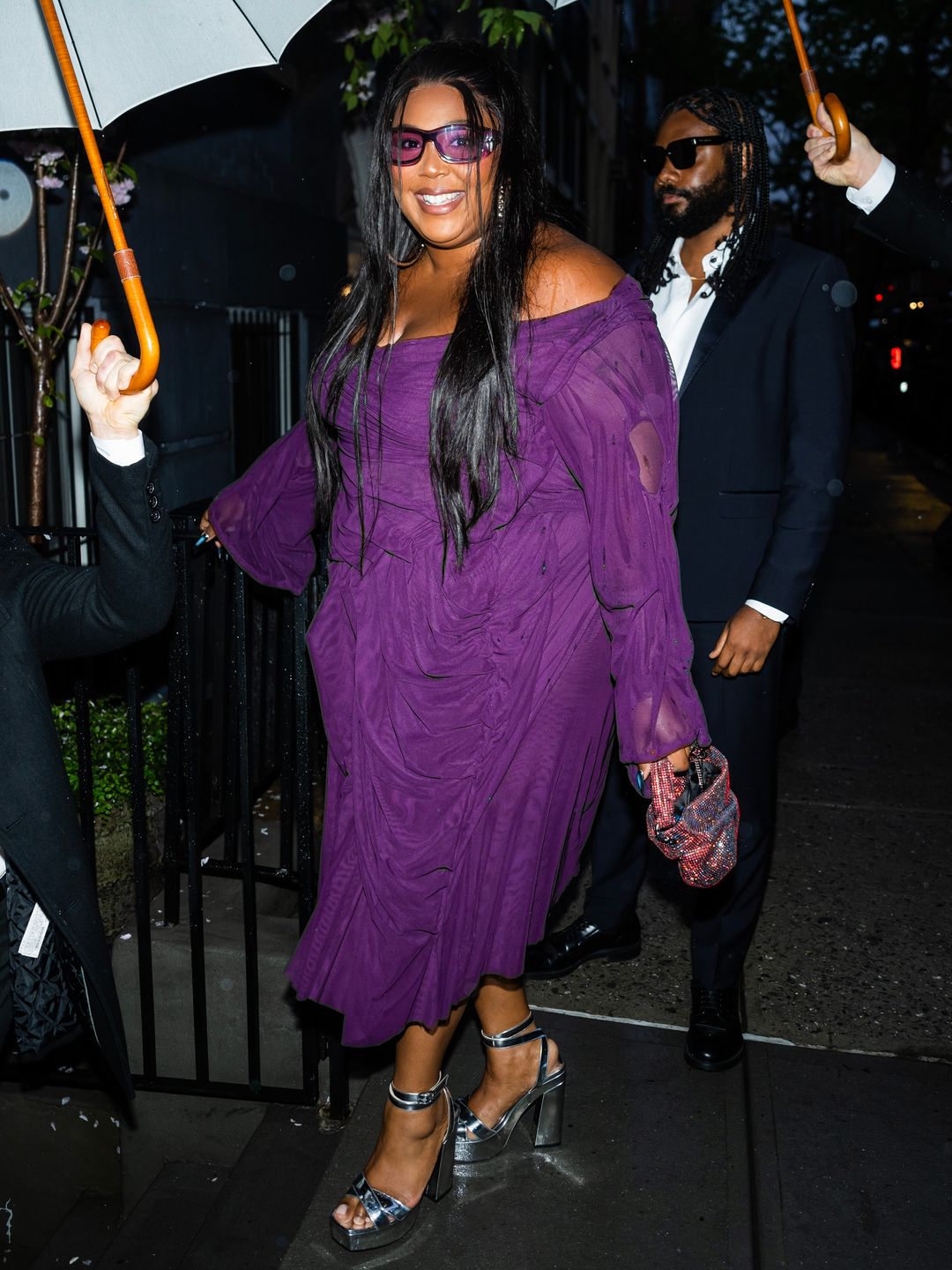 Lizzo hopped on the Dopamine Dressing trend in a vivid purple hue 
