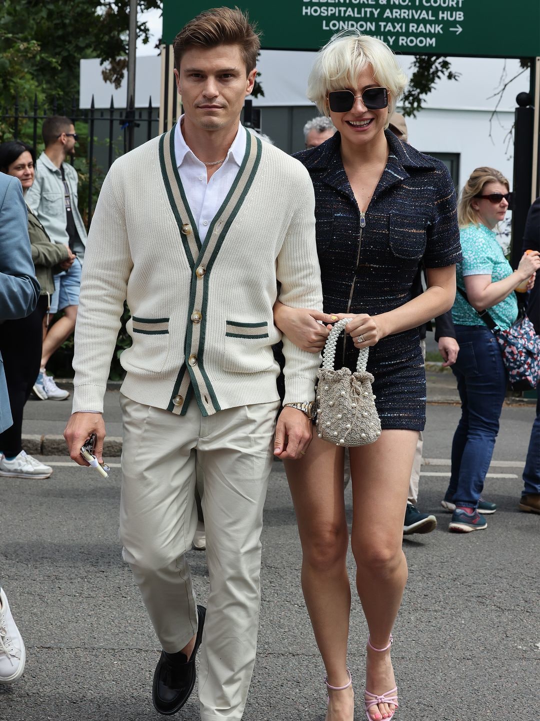 Pixie Lott and Oliver Cheshire attend the Evian Suite on day one of the Wimbledon Tennis Championships 