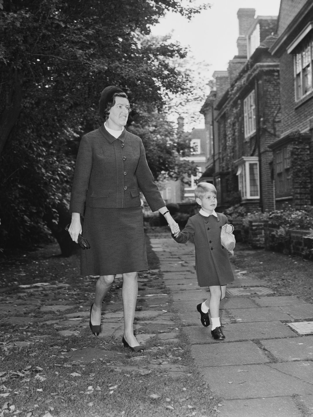 Prince Edward walking with nanny Mabel Anderson