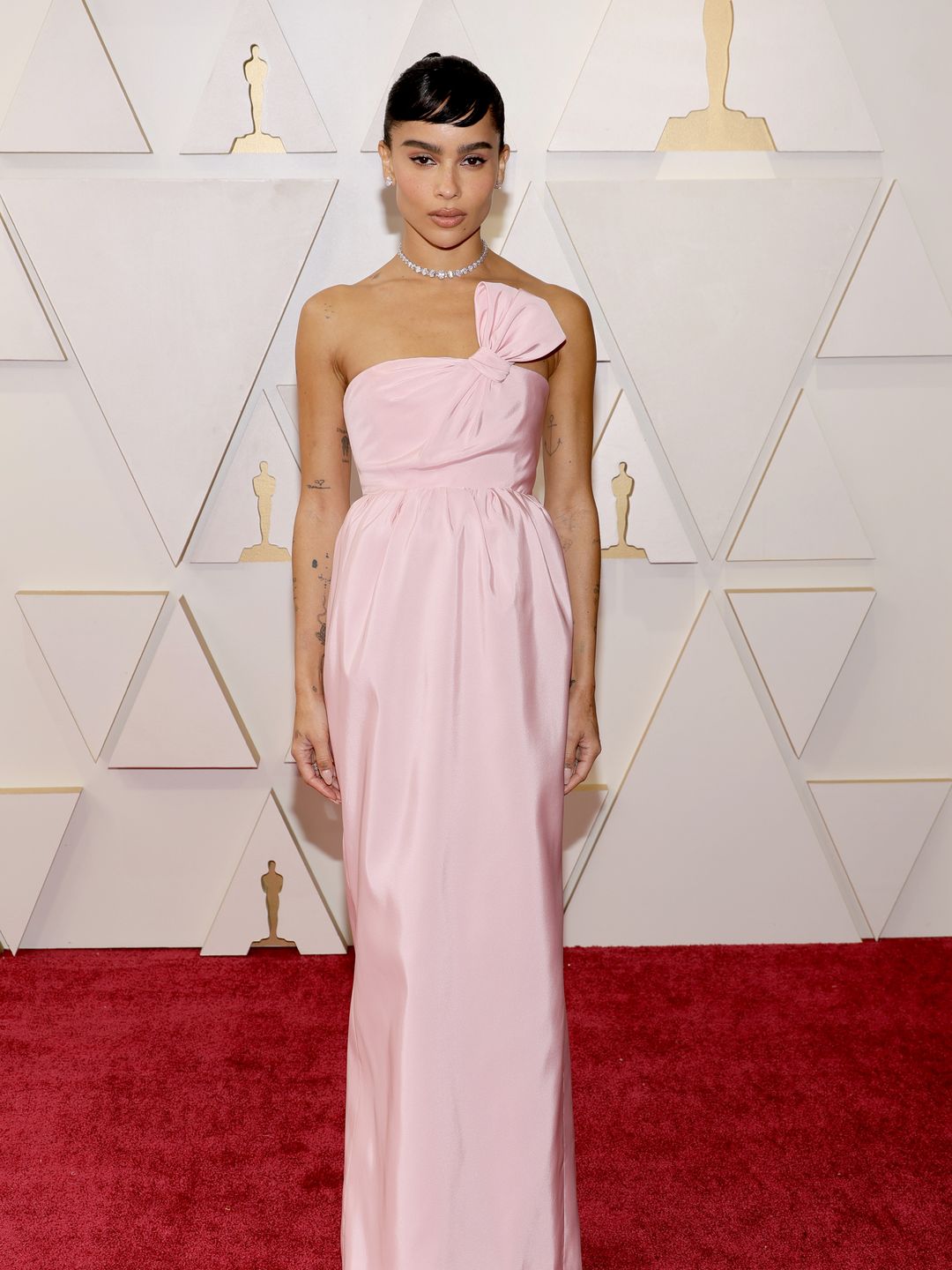 Zoë Kravitz attends the 94th Annual Academy Awards in a baby pink strapless gown