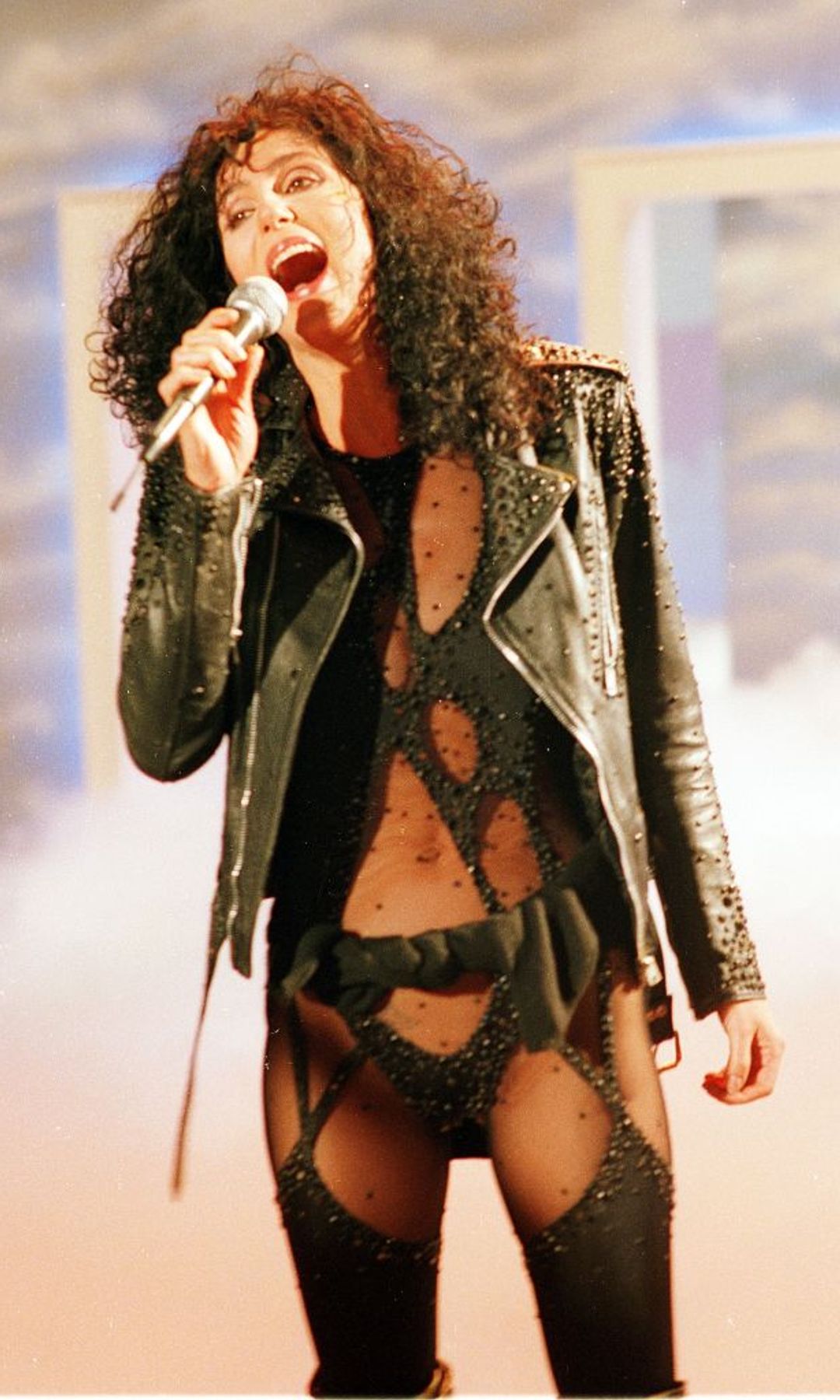 Cher's in the famous cut-out body suit in 1992 