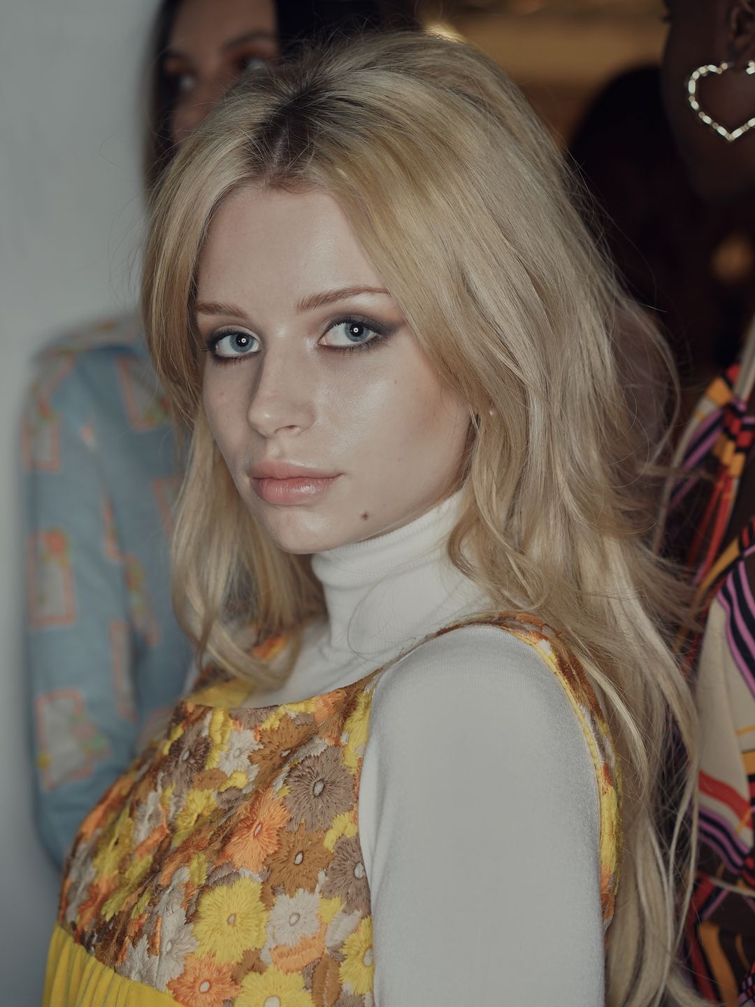 Lottie Moss channelling Sharon Tate backstage before hitting the runway at the Oxfam Fashion Fighting Poverty Catwalk Show in 2019