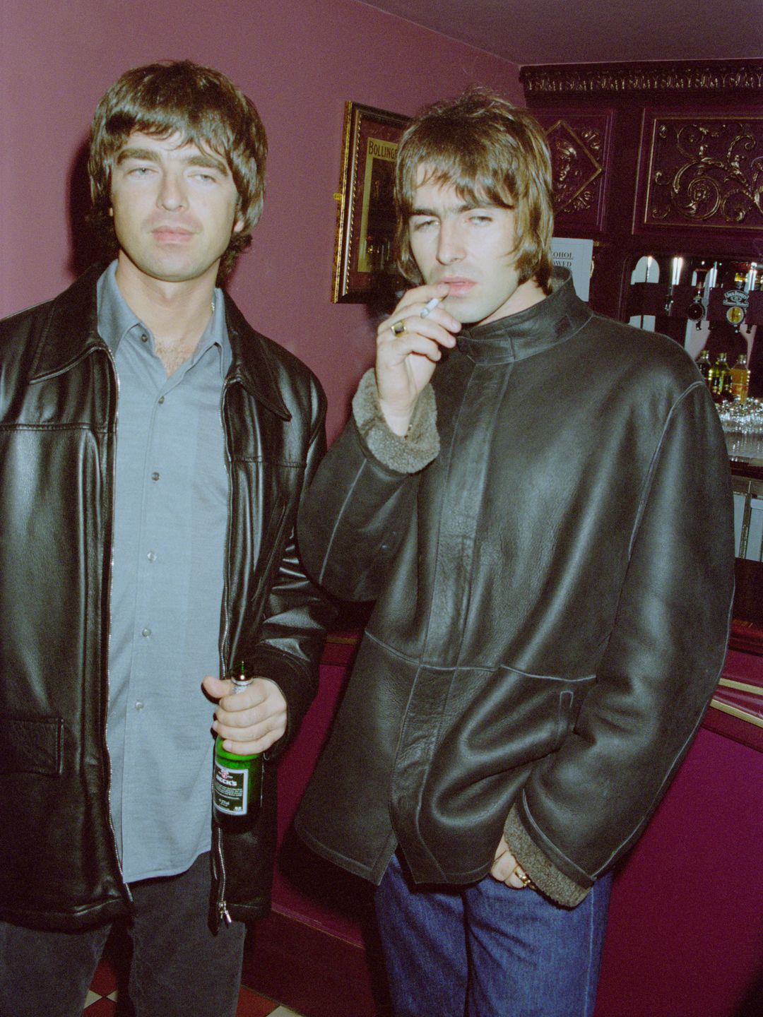 British musicians Liam and Noel Gallagher of rock group Oasis at the Lyceum Theatre for Steve Coogan's show 