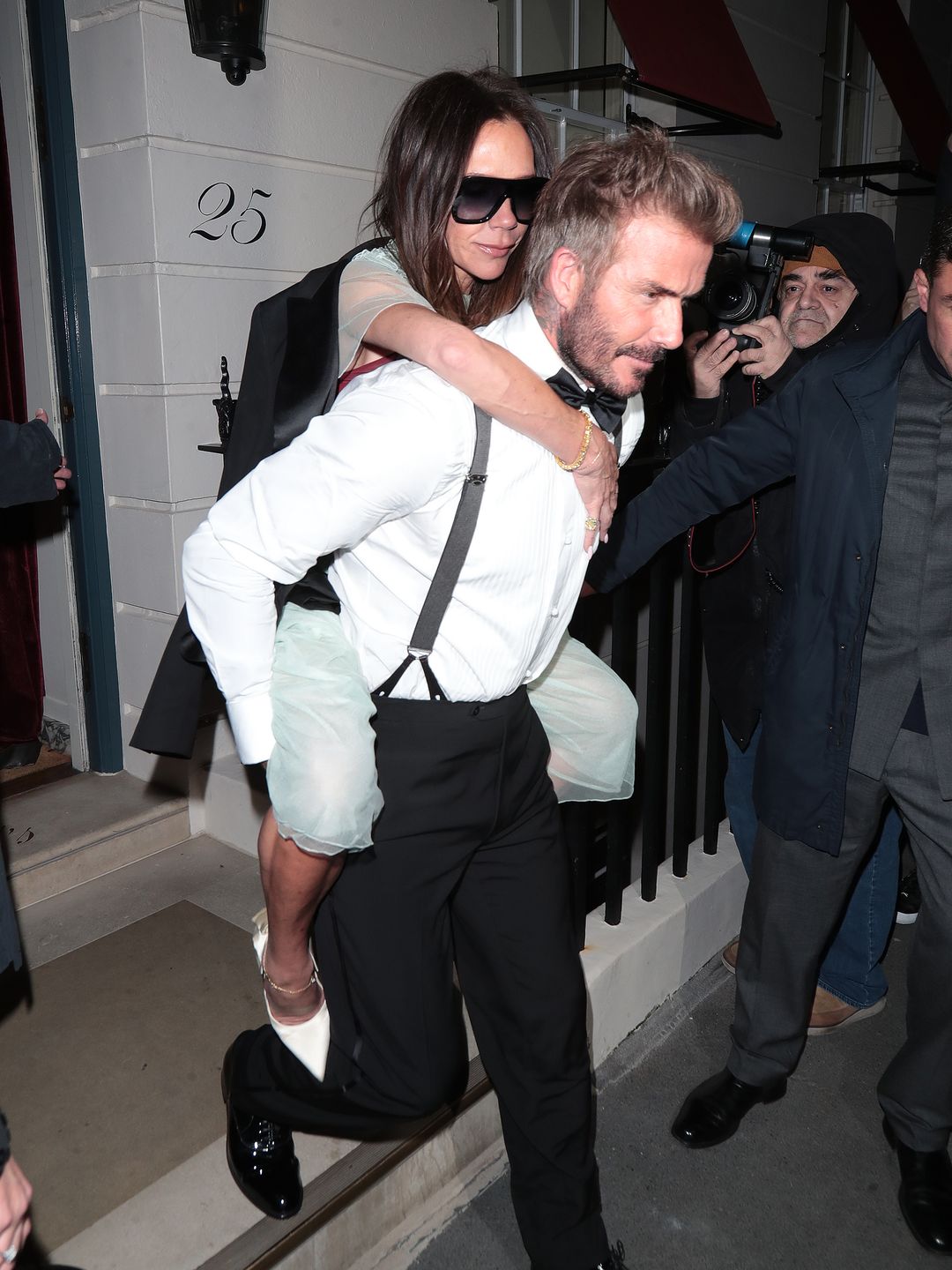 David Beckham and Victoria Beckham are seen leaving Victoria Beckham's 50th Birthday Party at Oswaldâs on April 20, 2024 in London, England