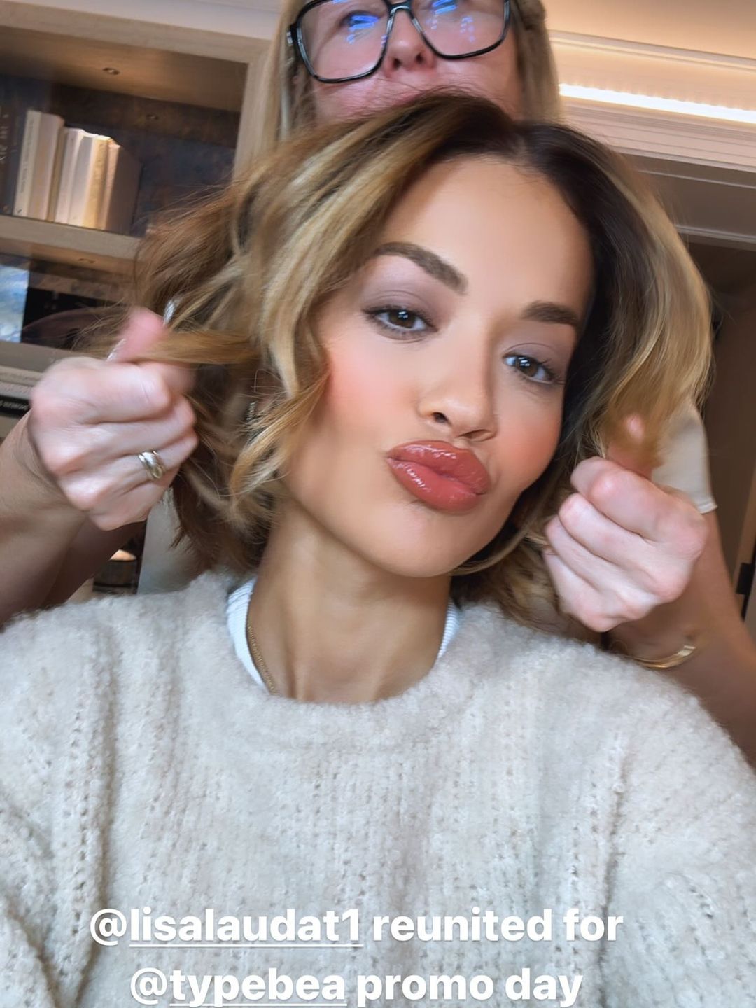 Rita Ora and hairstylist doing her hair