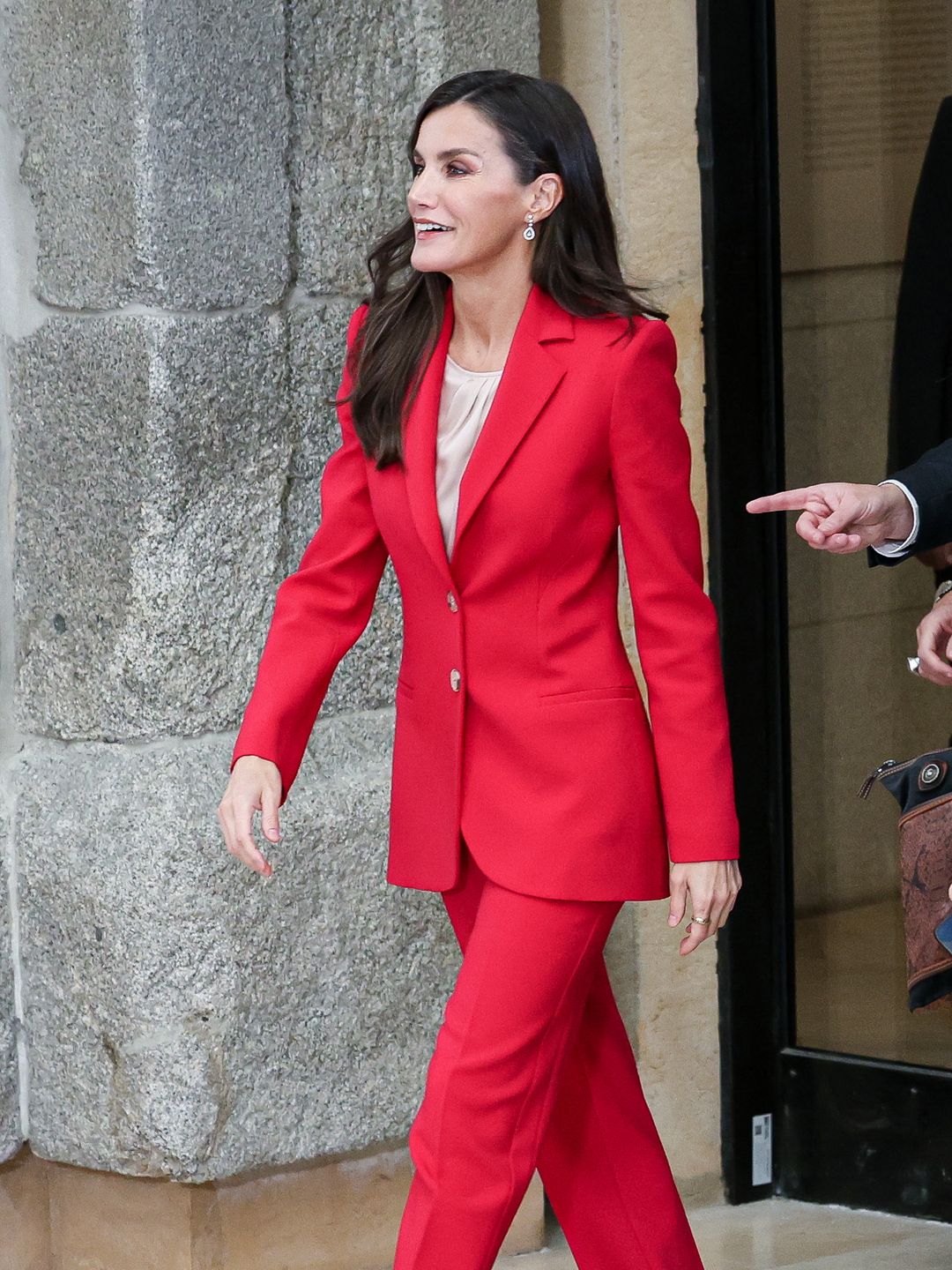 Queen Letizia wears a red suit and nude heels to attend the International Journalism Awards in Spain