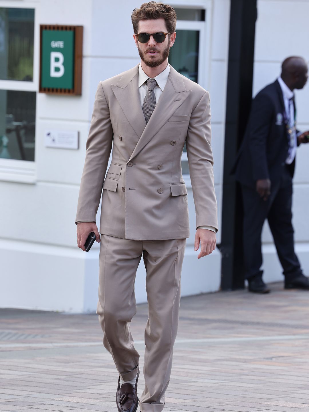 LONDON, ENGLAND - JULY 15: Andrew Garfield attends day thirteen of the Wimbledon Tennis Championships at All England Lawn Tennis and Croquet Club on July 15, 2023 in London, England. (Photo by Neil Mockford/GC Images)