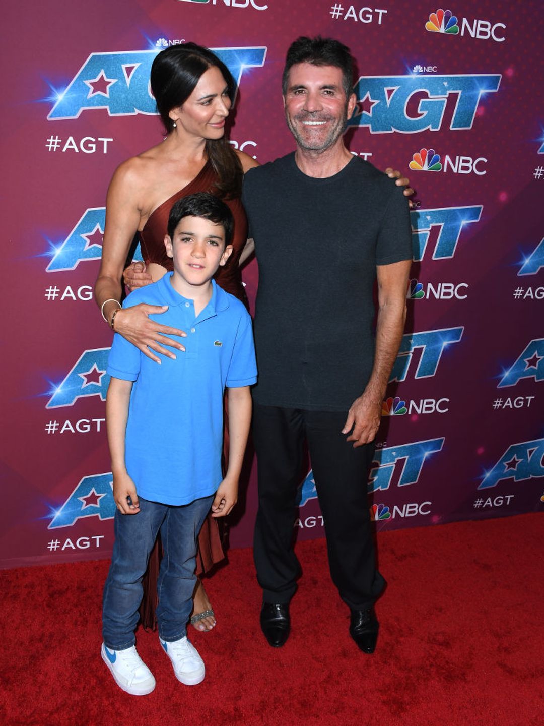 Lauren Silverman, Eric Cowell and Simon Cowellarrives at the Red Carpet For "America's Got Talent" Season 17 Live Show in 2022