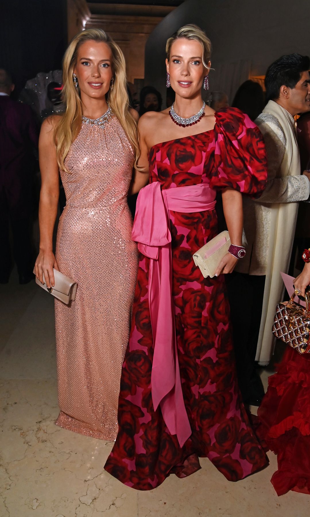 Lady Eliza Spencer in a pink dress and Lady Amelia Spencer in a rose dress