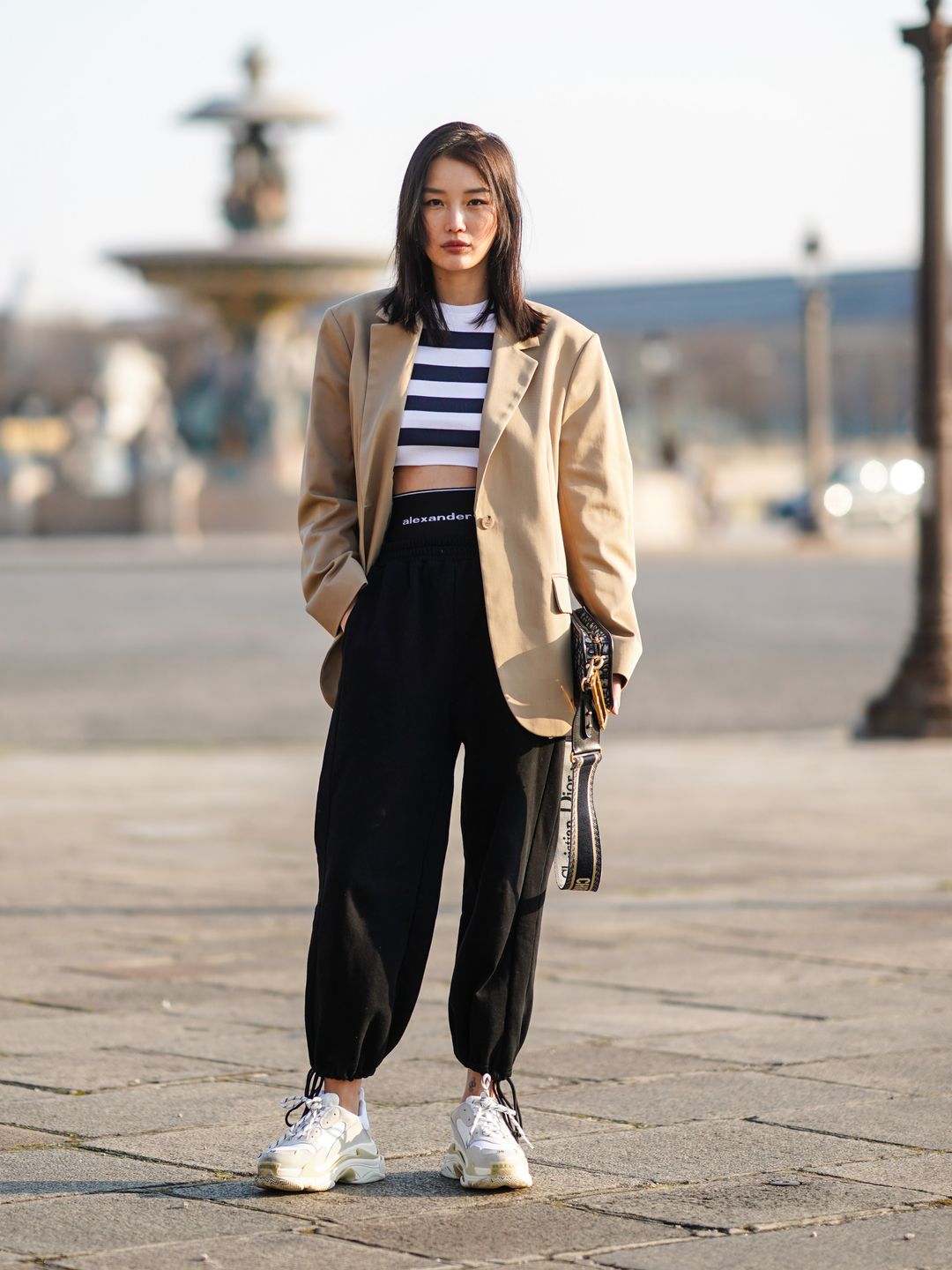 An oversize blazer in a light palette makes for ideal summer track pant style