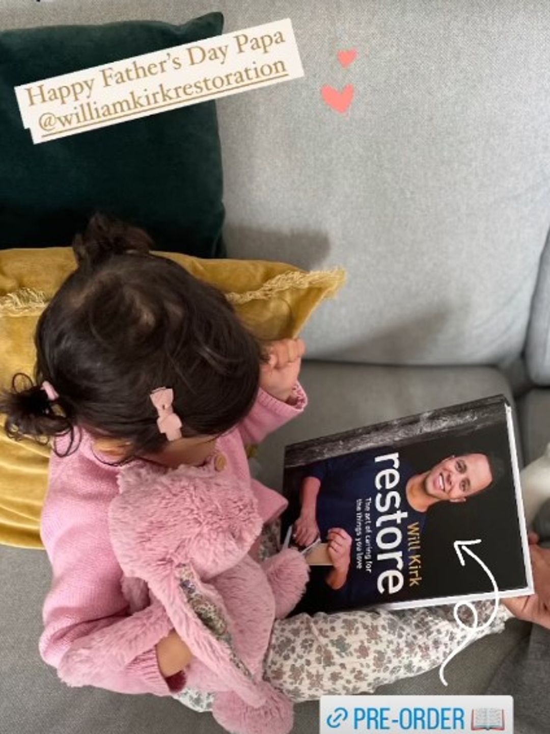 Will Kirk's daughter looking at his book