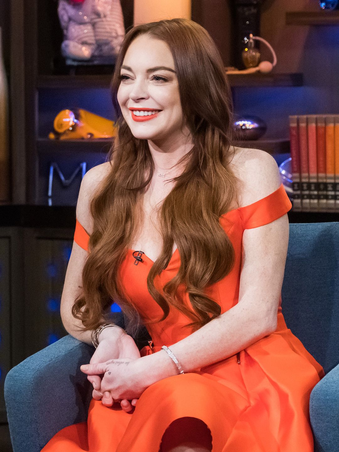 Lindsay Lohan smiling while sat on a chat show