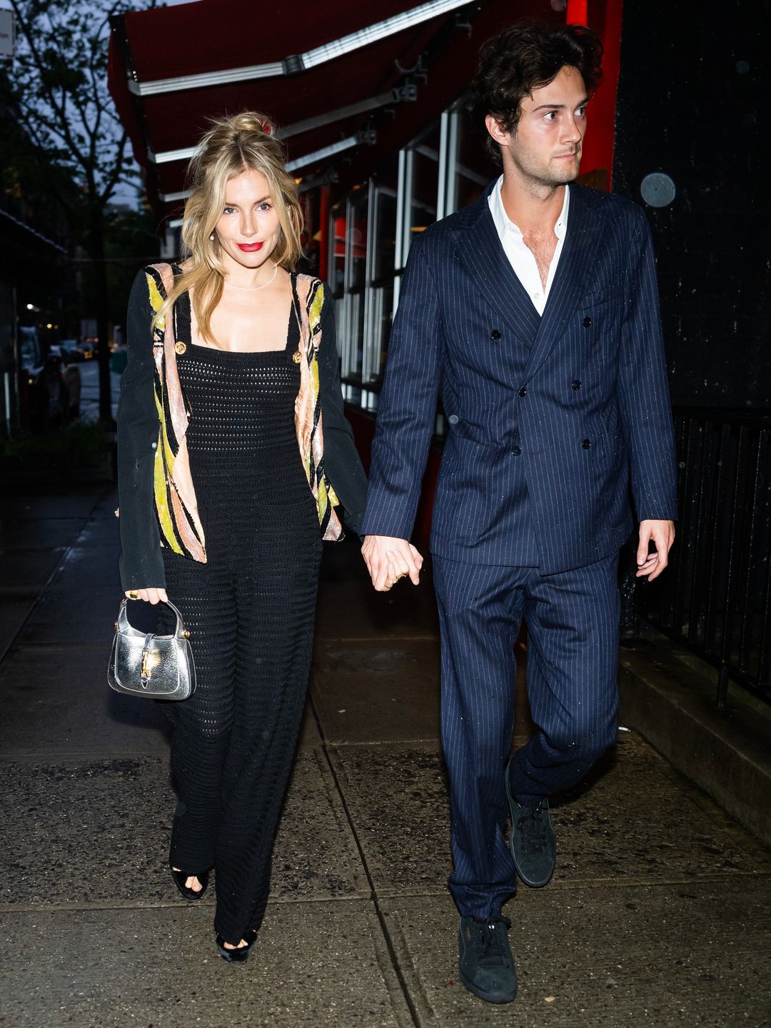 Sienna Miller looked chic alongside her boyfriend Oli Green 