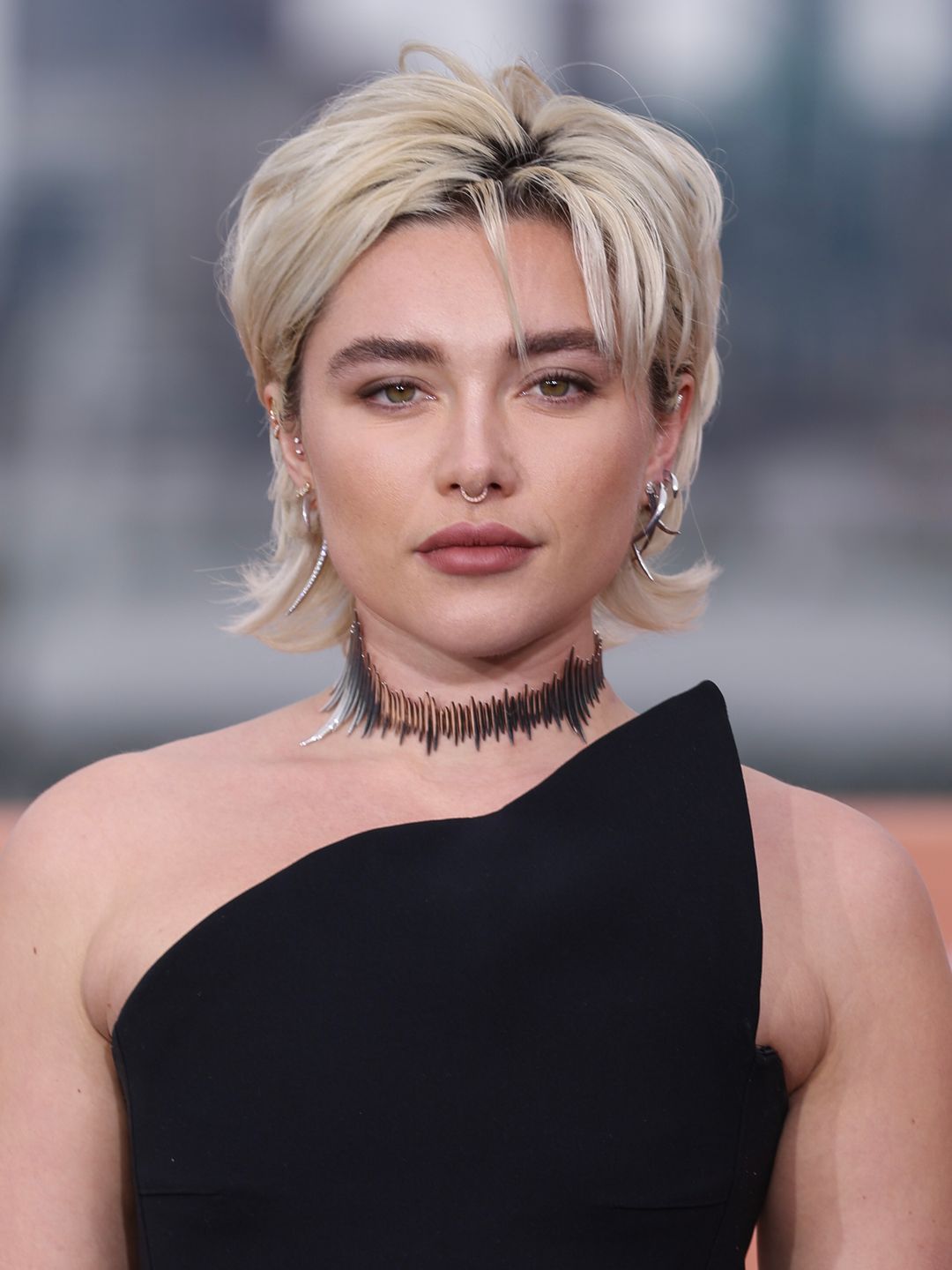 Florence Pugh with a bleach blonde textured Bixie at the photocall for Dune: Part Two