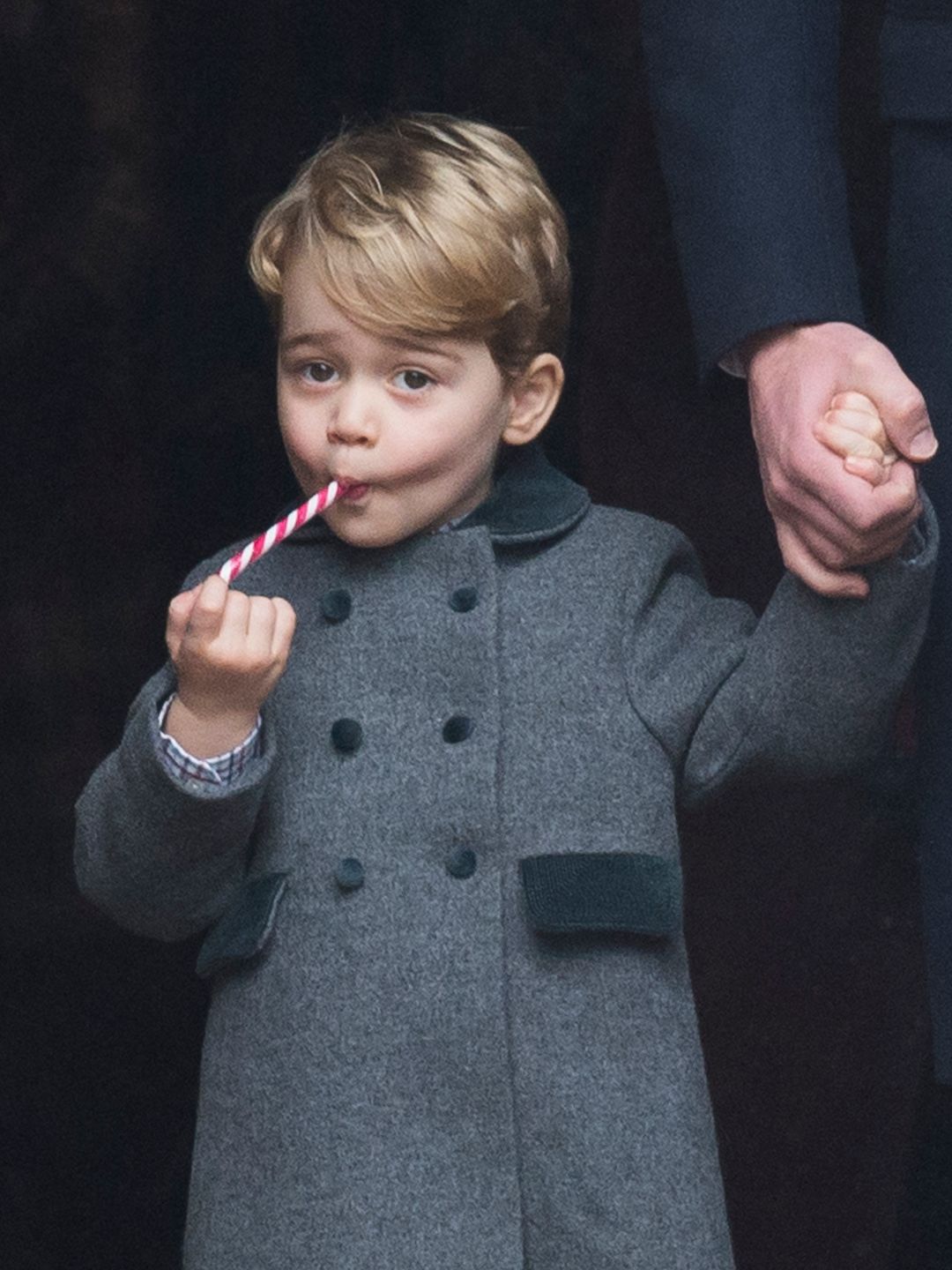 Prince George eating a candy cane