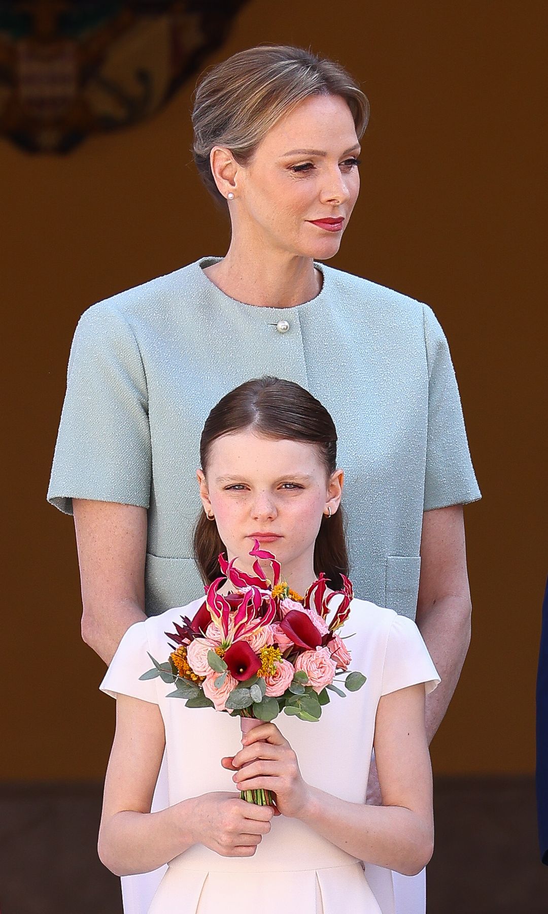 Princess Charlene standing with Princess Gabriella