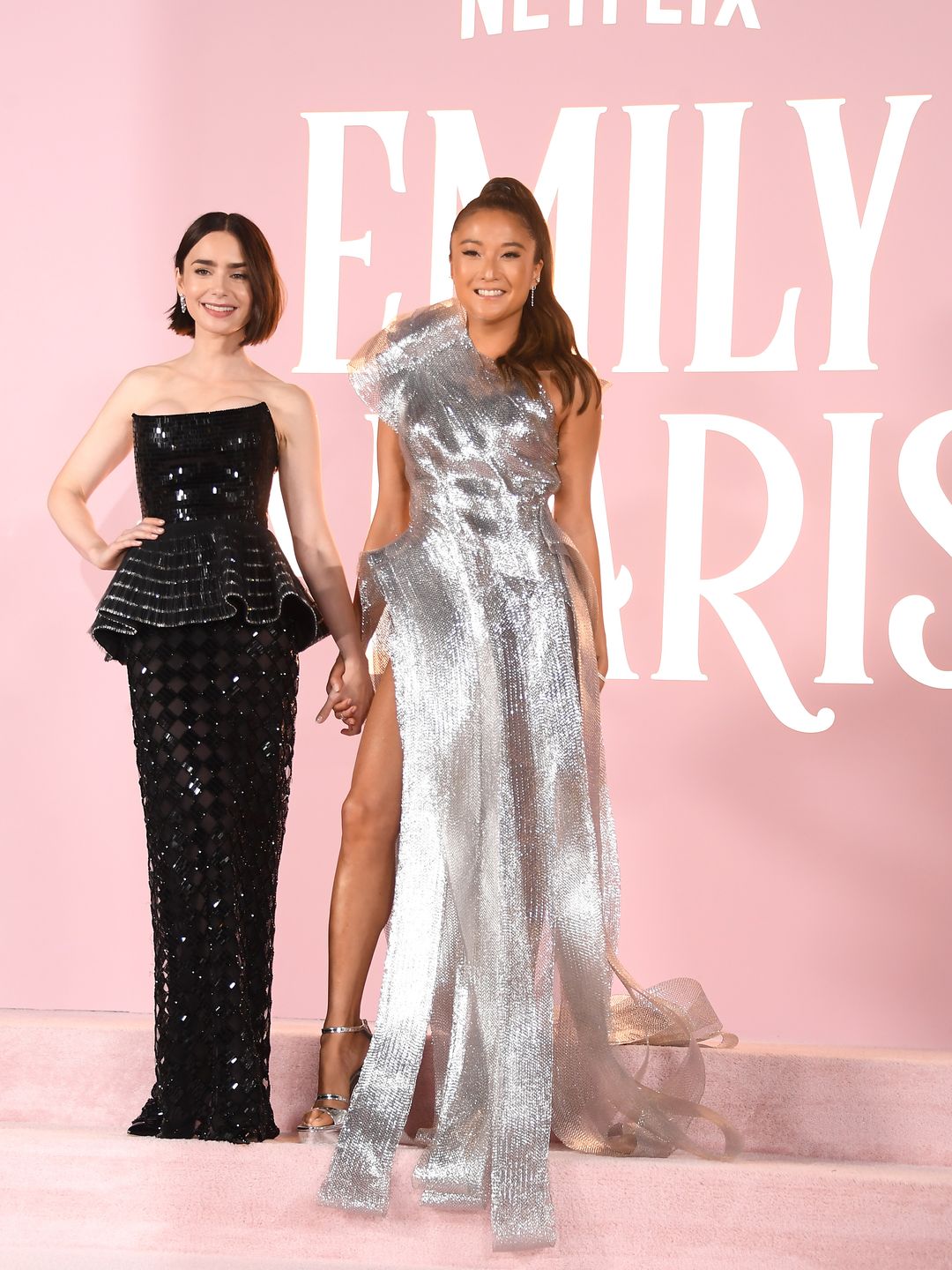 Lily Collins, Ashley Park arrives at the Premiere Of Netflix's "Emily In Paris" Season 4 Part 1 at The Egyptian Theatre Hollywood on August 14