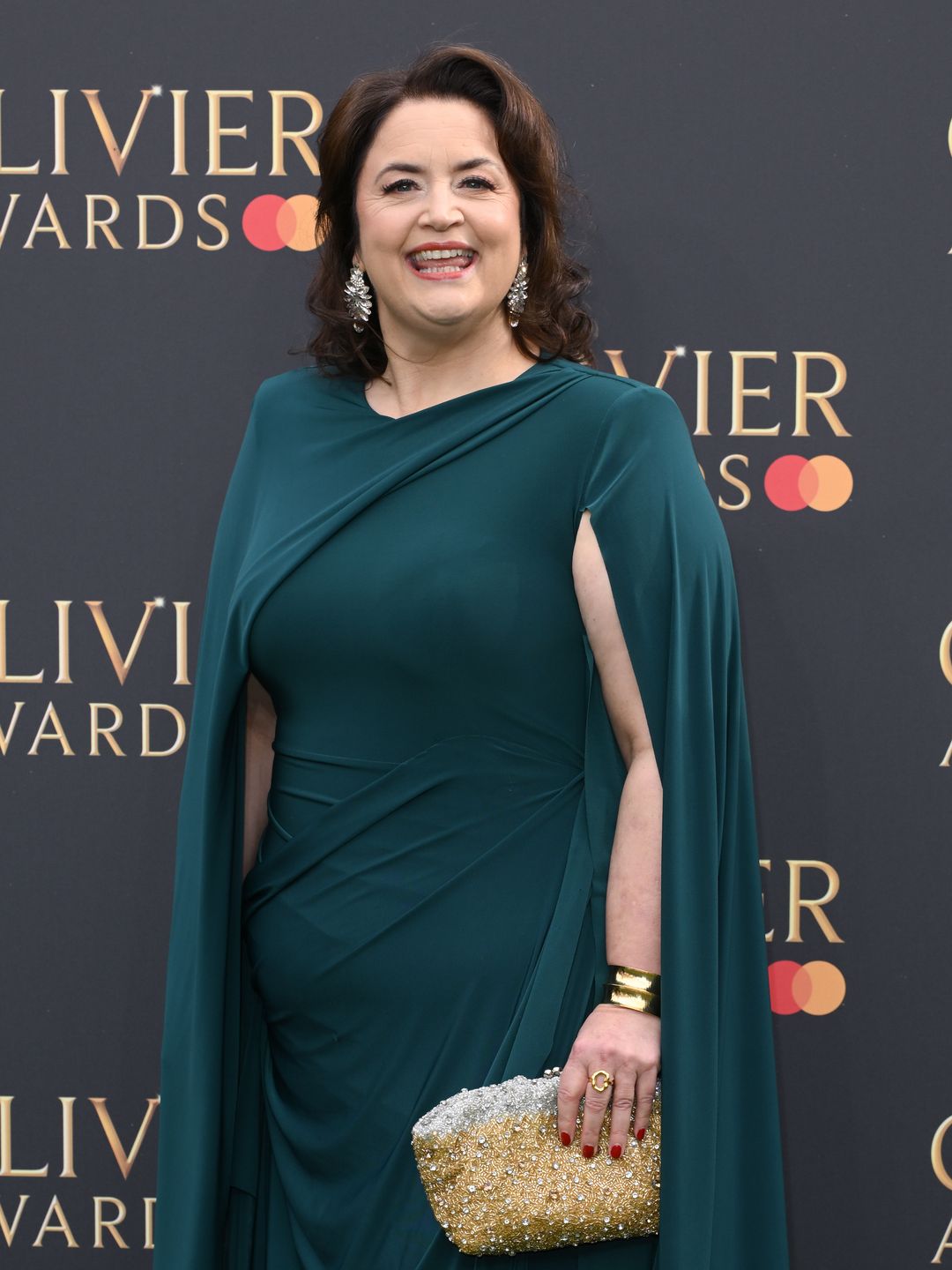 Ruth Jones in a green dress