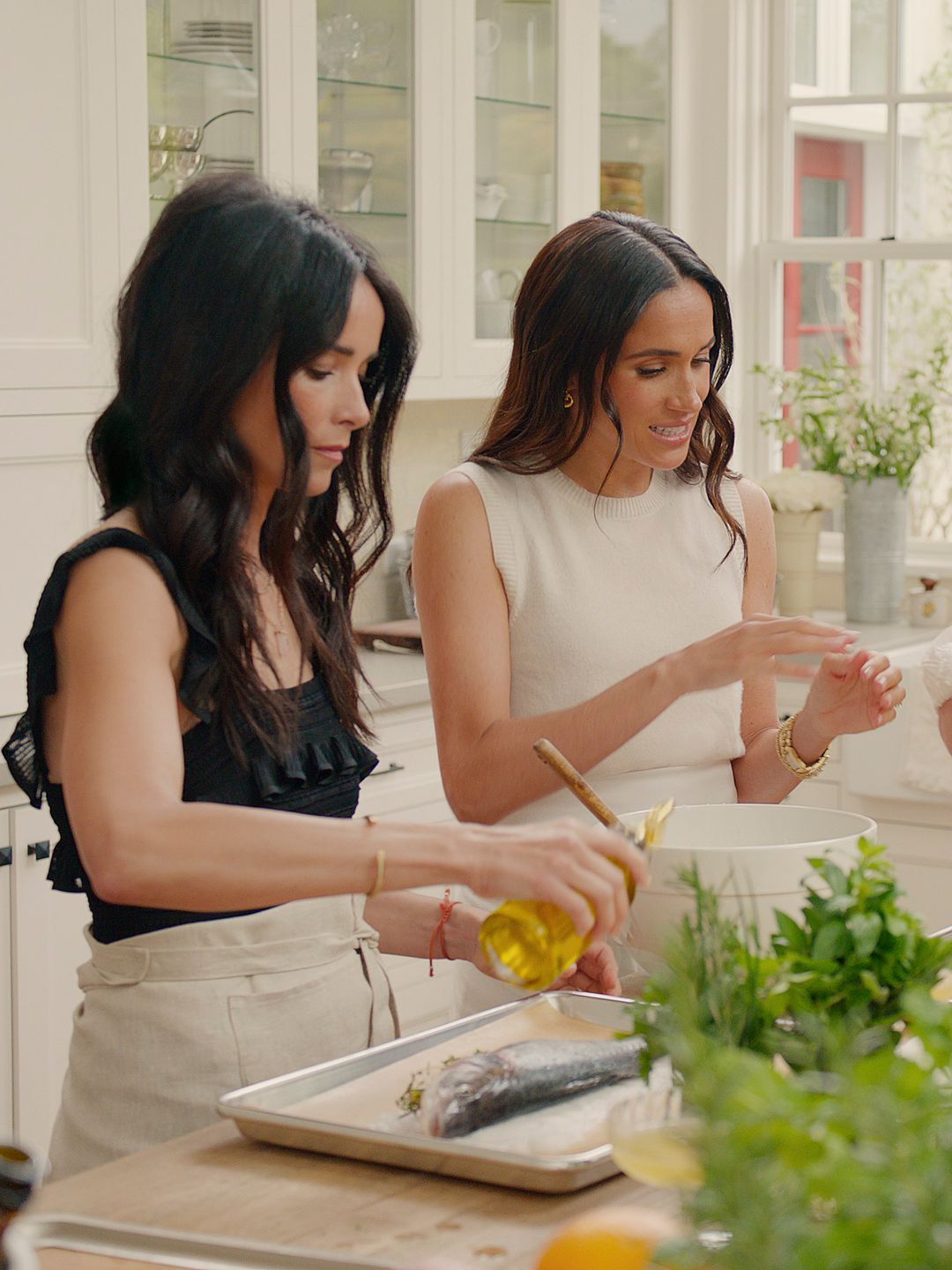 Abigail and Kelly helped Meghan to prepare a salt-baked fish