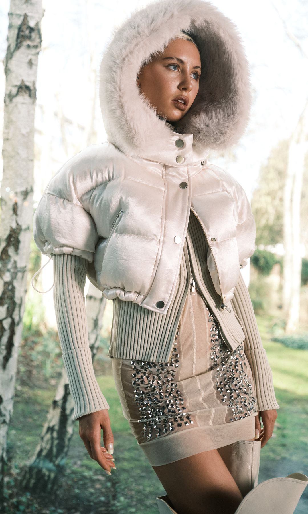 iris law in fur coat and sequin dress