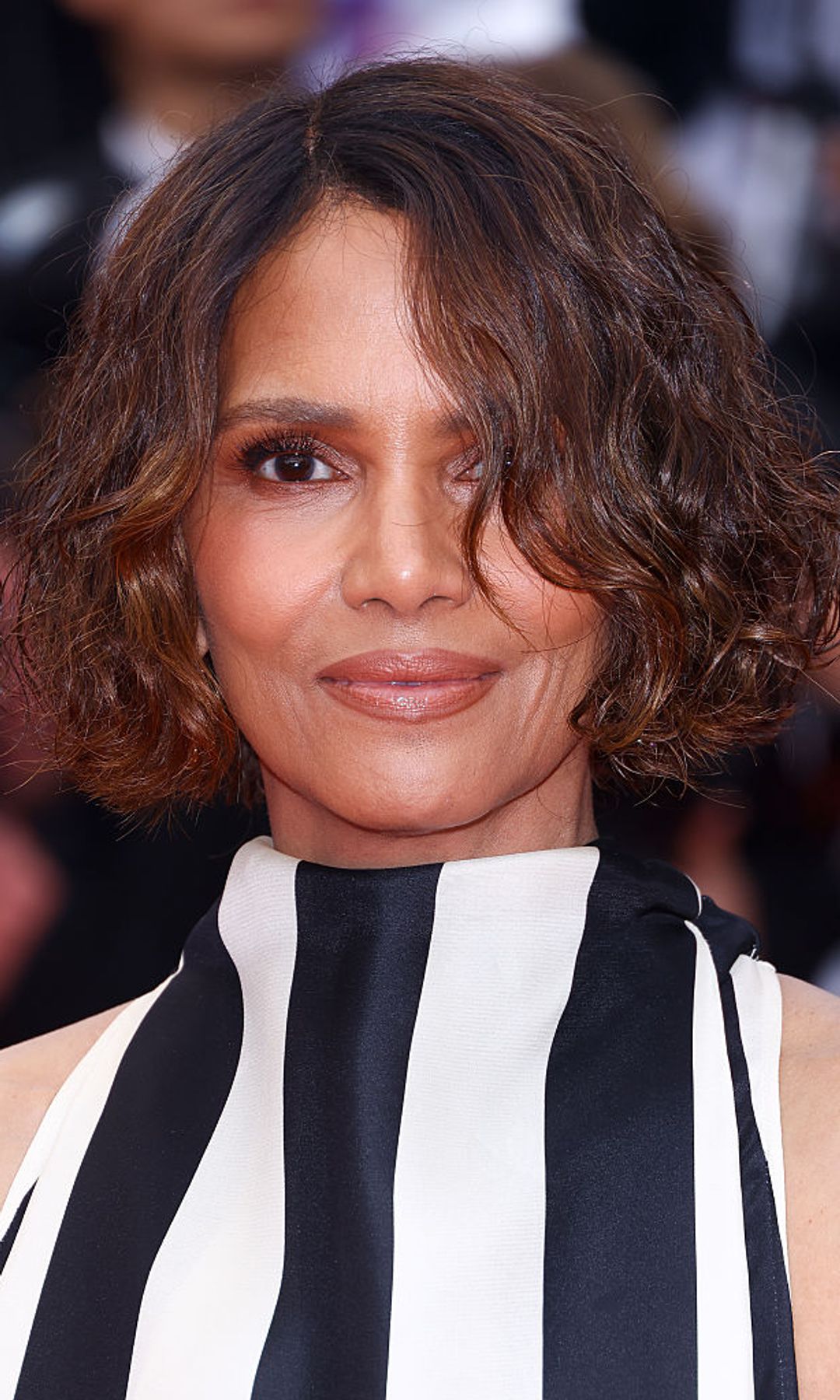 Halle Berry black and white striped dress and bob 