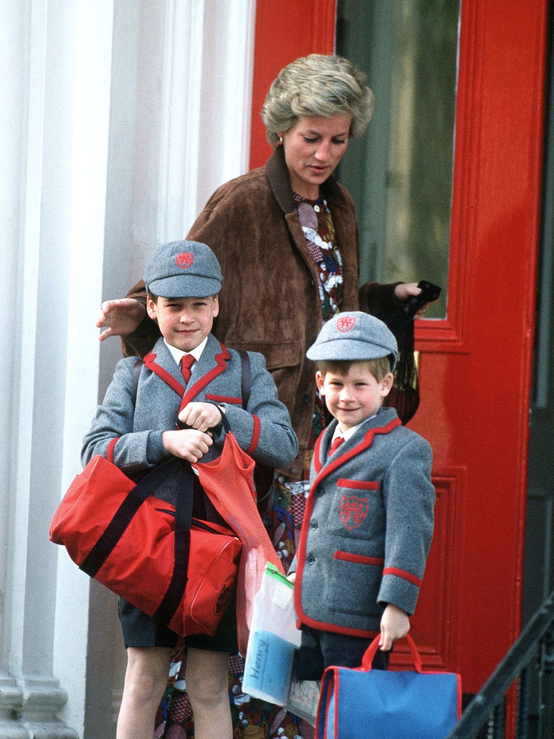 mother doing school run with two children