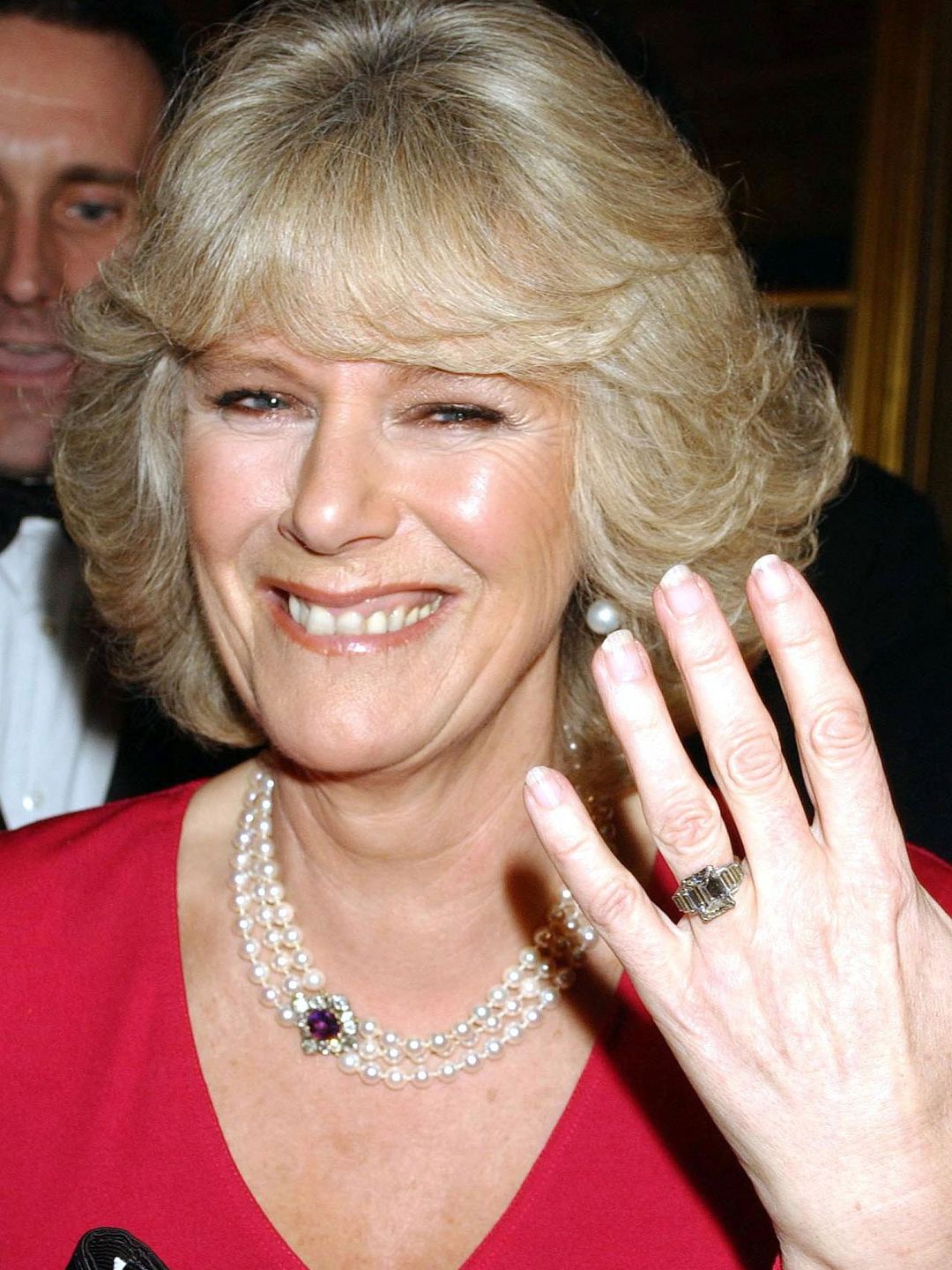 Camilla smiling and showing off her ring in February 2005