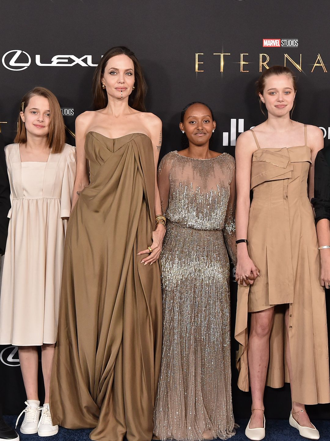 Maddox Jolie-Pitt, Vivienne Jolie-Pitt, Angelina Jolie, Zahara Jolie-Pitt, Shiloh Jolie-Pitt and Knox Jolie-Pitt attend the Los Angeles Premiere of Marvel Studios' "Eternals" on October 18, 2021 in Los Angeles, California.