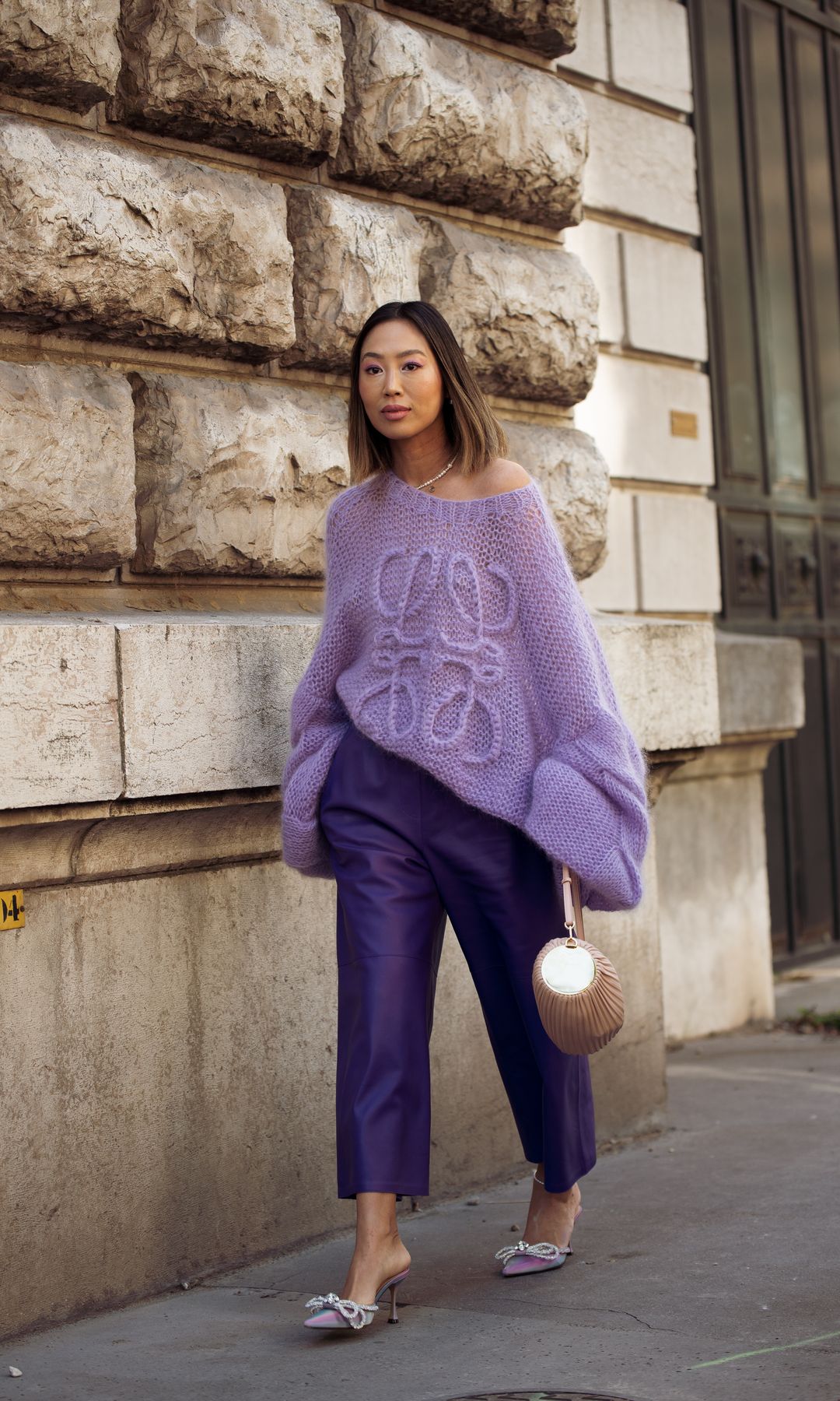 Aimee Song wears Loewe during PFW