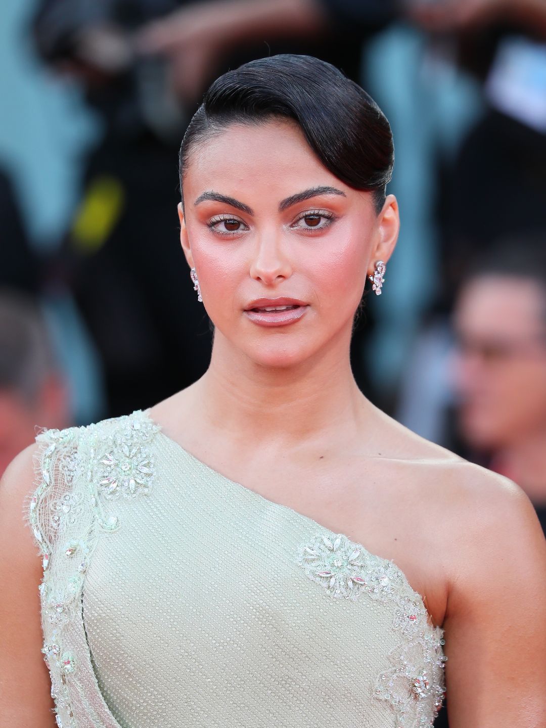 Camila Mendes on the red carpet wearing one shoulder dress