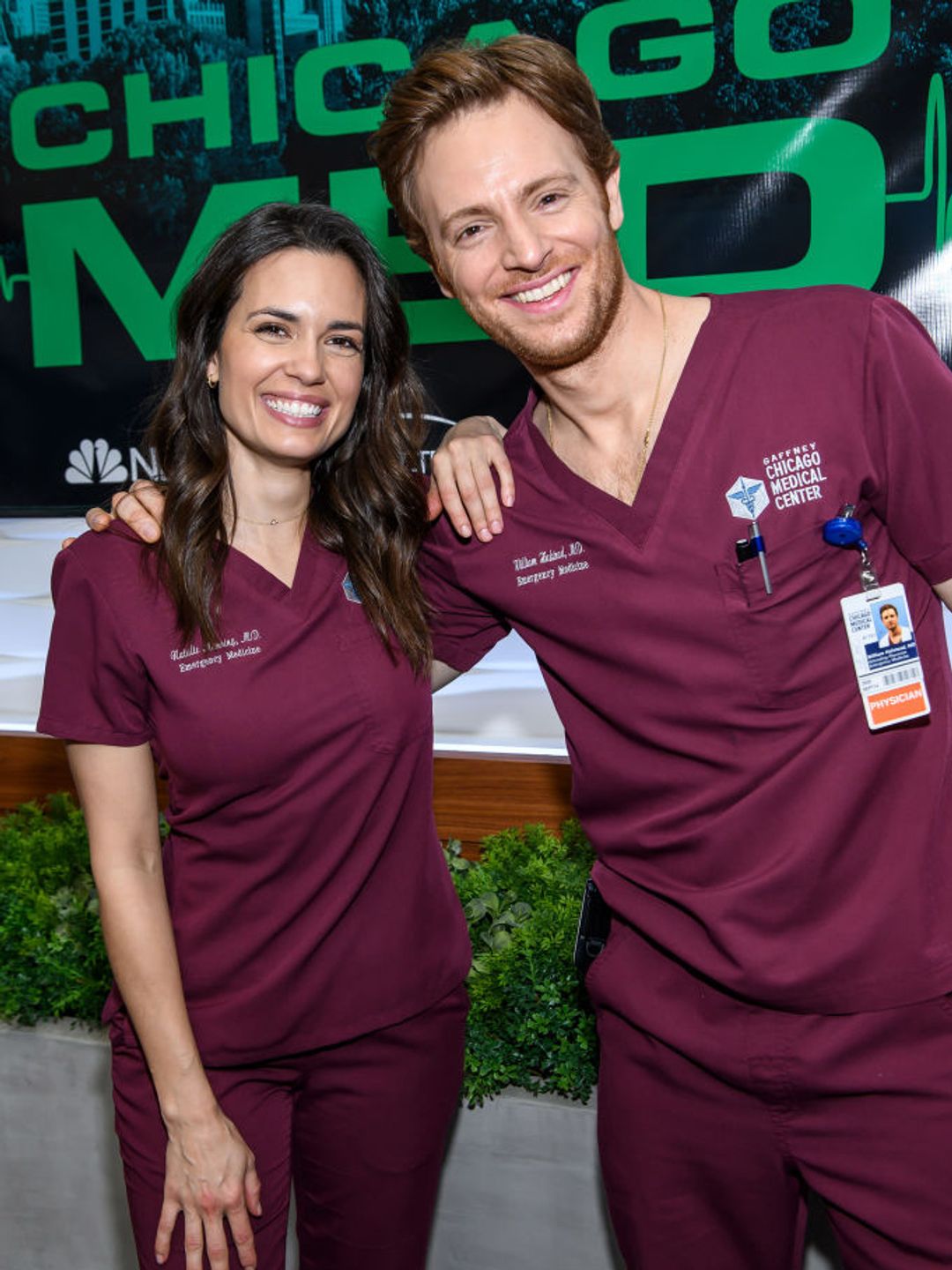 Torrey DeVitto and Nick Gehlfuss pose for a photo at a Chicago Med event