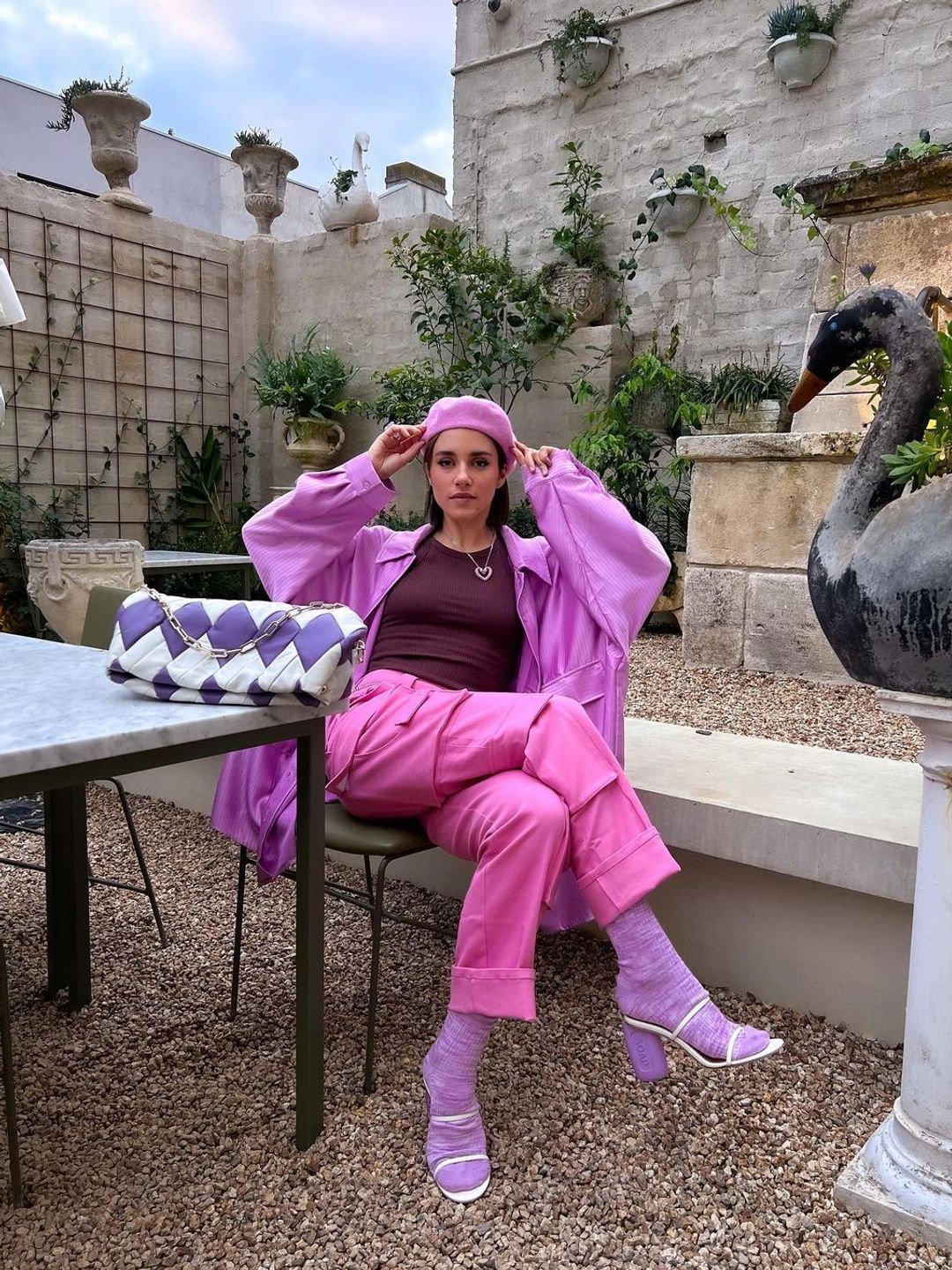 Influencer Maxine Wylde shows of her pink and purple outfit proving colour coordination is very on trend