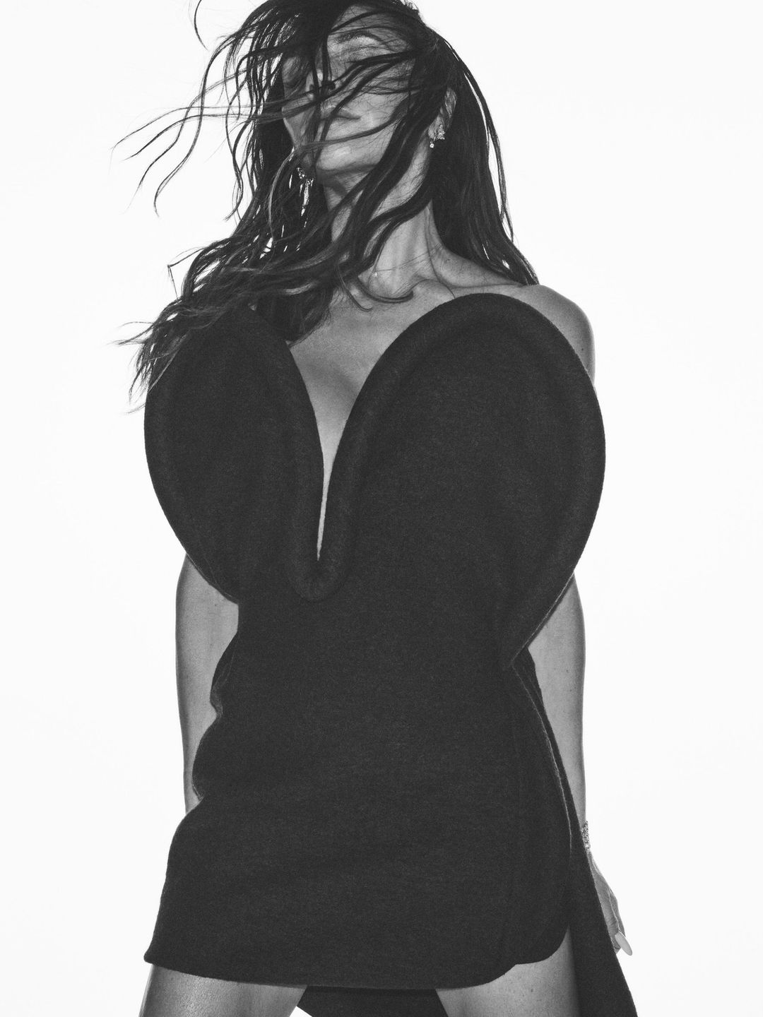 Victoria Beckham poses in a mini dress for the new campaign of her new colleciton