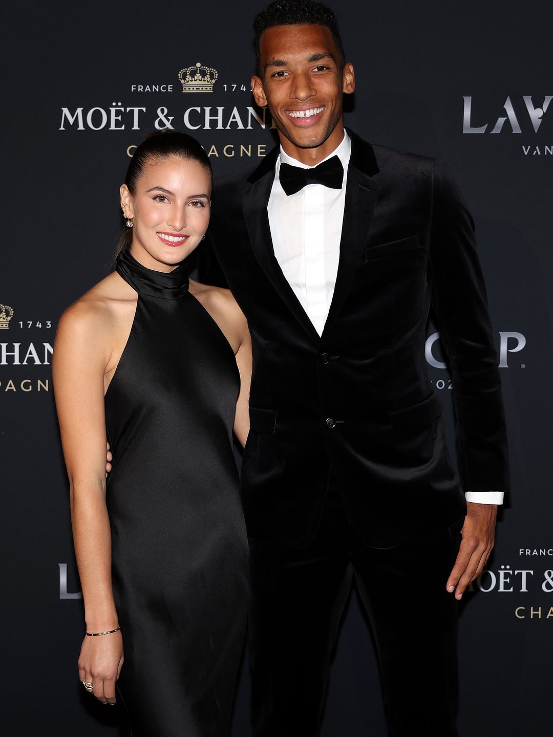 Felix Auger-Aliassime of Team World and Nina Ghaibi arrive on the black carpet for the Laver Cup Gala ahead of the Laver Cup at Rogers Arena on September 21, 2023 in Vancouver, British Columbia.
