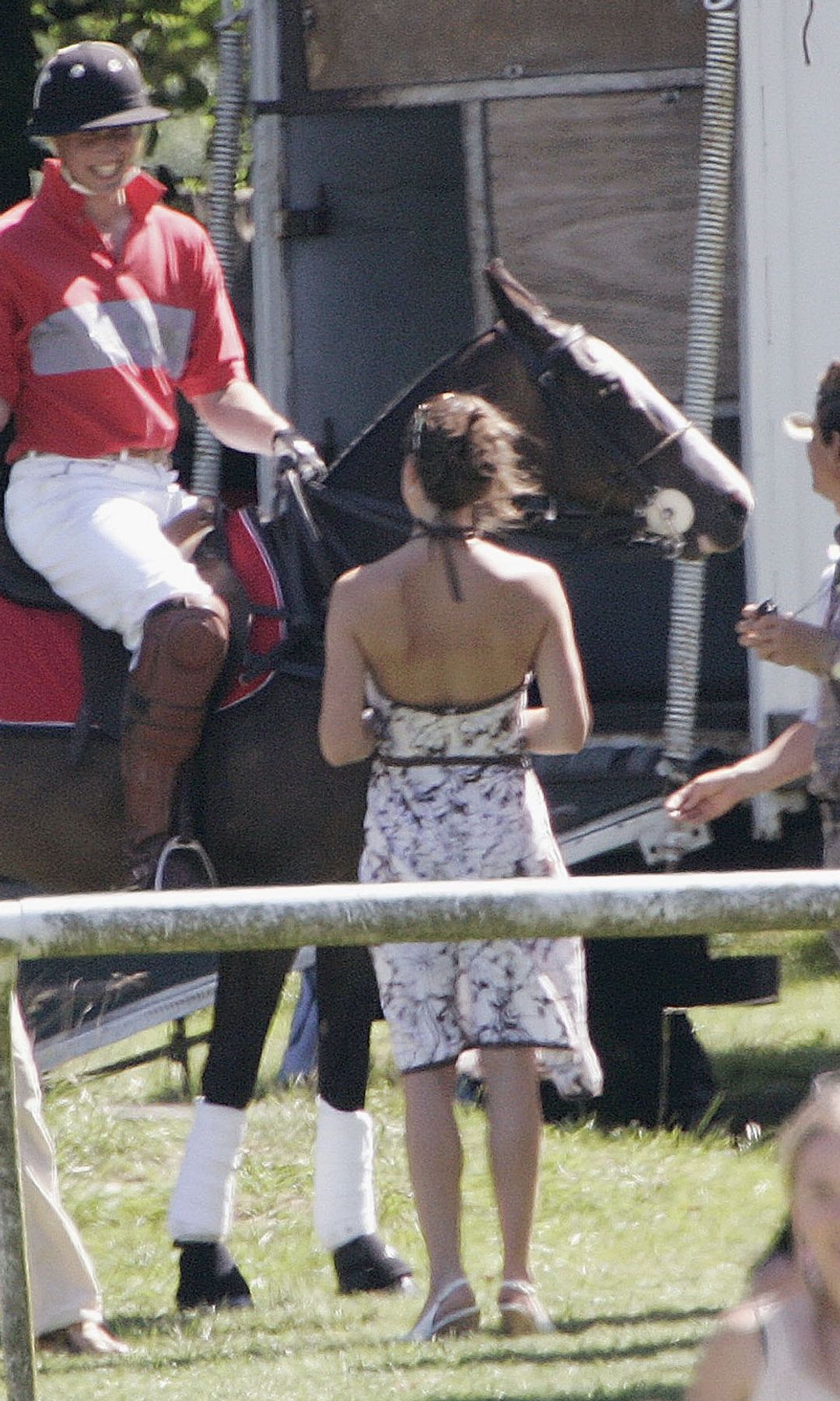 Kate Middleton in a backless halterneck dress at the polo