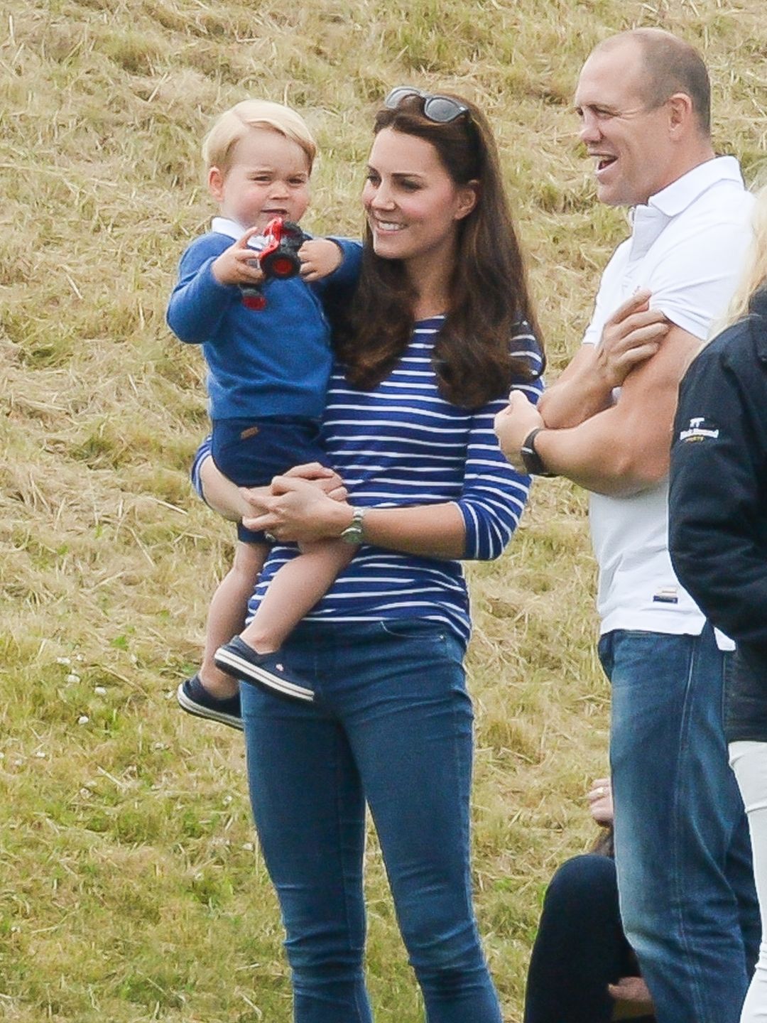 Princess Kate (then Duchess of Cambridge) with her son Prince George and Mike Tindall at the Gigaset Charity Polo Match at Beaufort Polo Club on June 14, 2015 in Tetbury, England 