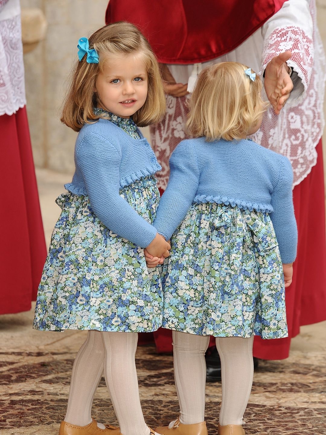 princess leonor and infanta sofia in blue dresses at mass