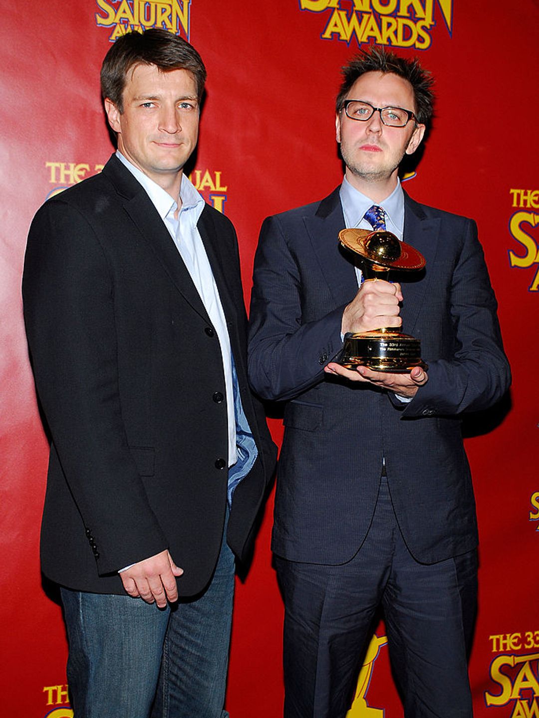 Nathan Fillion and director James Gunn smiling together in 2007